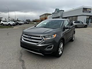 <p>2018 FORD EDGE TITANIUM WITH 41756 KMS!! FULLY LOADED ALL-WHEEL DRIVE SUV WITH APPLE CARPLAY/ANDRIOD AUTO, NAVIGATION, BLUETOOTH, BACKUP CAMERA WITH SENSORS, HEATED AND COOLED FRONT SEATS, REAR SEATS, LEATHER SEATS, HEATED STEERING WHEEL, PUSH BUTTON START, LANE ASSIST, PARK ASSIST, BLIND SPOT DETECTION, COLLISION DETECTION, REMOTE START, POWER FOLDING MIRRORS, AUTO STOP/START, KEYLESS ENTRY AND SO MUCH MORE! </p><p>*** CREDIT REBUILDING SPECIALISTS ***</p><p>APPROVED AT WWW.CROSSROADSMOTORS.CA</p><p>INSTANT APPROVAL! ALL CREDIT ACCEPTED, SPECIALIZING IN CREDIT REBUILD PROGRAMS</p><p>All VEHICLES INSPECTED---FINANCING & EXTENDED WARRANTY AVAILABLE---ALL CREDIT APPROVED ---CAR PROOF AND INSPECTION AVAILABLE ON ALL VEHICLES.</p><p>FOR A TEST DRIVE PLEASE CALL 403-764-6000 OR FOR AFTER HOUR INQUIRIES PLEASE CALL403-804-6179. </p><p>FAST APPROVALS </p><p>AMVIC LICENSED DEALERSHIP</p>