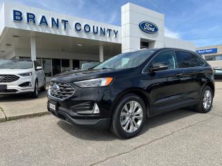 <p class=MsoNoSpacing><strong style=mso-bidi-font-weight: normal;><br />KEY FEATURES: 2022 Ford Edge, Titanium, AWD, 2.0L EcoBoost, Black, Panoramic Roof, evasive steering, leather, voice activated navigation(yrs), cold weather package, heated steering wheel, heated and Cooled front seats, 20 inch wheels, rear backup camera, rear sensors, remote stop, pre-collision assist, intelligent Access, Lane keeps system, fordpass, sync 3 connect and more.</strong></p><p class=MsoNoSpacing><strong style=mso-bidi-font-weight: normal;><br />Please Call 519-756-6191, Email sales@brantcountyford.ca for more information and availability on this vehicle.<span style=mso-spacerun: yes;>  </span>Brant County Ford is a family owned dealership and has been a proud member of the Brantford community for over 40 years!</strong></p><p class=MsoNoSpacing><strong style=mso-bidi-font-weight: normal;> </strong></p><p class=MsoNoSpacing><strong style=mso-bidi-font-weight: normal;><br />** PURCHASE PRICE ONLY (Includes) Fords Delivery Allowance</strong></p><p class=MsoNoSpacing><br />** See dealer for details.</p><p class=MsoNoSpacing>*Please note all prices are plus HST and Licencing.</p><p class=MsoNoSpacing>* Prices in Ontario, Alberta and British Columbia include OMVIC/AMVIC fee (where applicable), accessories, other dealer installed options, administration and other retailer charges.</p><p class=MsoNoSpacing>*The sale price assumes all applicable rebates and incentives (Delivery Allowance/Non-Stackable Cash/3-Payment rebate/SUV Bonus/Winter Bonus, Safety etc</p><p class=MsoNoSpacing>All prices are in Canadian dollars (unless otherwise indicated). Retailers are free to set individual prices.</p>