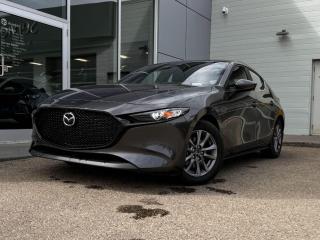 2023 Mazda Mazda3 Sport GS shown off in Grey! It cloth seating, a leather-wrapped steering wheel with mounted audio/cruise controls (adaptive), front heated seats, dual-zone climate control, a backup camera, and so much more. Full photos and description coming soon!Clean CarFax