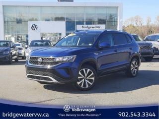 New Price! Blue 2023 Volkswagen Taos Comfortline Apple Carplay | Android Auto | Sirus XM AWD 7-Speed Automatic 1.5L I4 Turbocharged DOHC 16V LEV3-SULEV30 158hp Bridgewater Volkswagen, Located in Bridgewater Nova Scotia.4-Wheel Disc Brakes, 5.20 Axle Ratio, 6 Speakers, ABS brakes, Air Conditioning, Alloy wheels, AM/FM radio: SiriusXM, Auto High-beam Headlights, Auto-dimming Rear-View mirror, Automatic temperature control, Brake assist, Bumpers: body-colour, Compass, Delay-off headlights, Driver door bin, Driver vanity mirror, Dual front impact airbags, Dual front side impact airbags, Electronic Stability Control, Emergency communication system: VW Car-Net services (capabilities require enrollment or subscription), Exterior Parking Camera Rear, Four wheel independent suspension, Front anti-roll bar, Front Bucket Seats, Front dual zone A/C, Front reading lights, Front Strut Rear Multi-Link Suspension, Fully automatic headlights, Heated door mirrors, Heated Front Comfort Seats, Heated front seats, Heated steering wheel, Illuminated entry, Leather Shift Knob, Leatherette Seating Surfaces, Low tire pressure warning, Occupant sensing airbag, Outside temperature display, Overhead airbag, Overhead console, Panic alarm, Passenger door bin, Passenger vanity mirror, Power door mirrors, Power driver seat, Power steering, Power windows, Radio data system, Radio: 8 Touchscreen Infotainment System, Rain sensing wipers, Rear anti-roll bar, Rear reading lights, Rear window defroster, Rear window wiper, Remote keyless entry, Roof rack: rails only, Security system, Speed control, Speed-sensing steering, Split folding rear seat, Spoiler, Steering wheel mounted audio controls, Tachometer, Telescoping steering wheel, Tilt steering wheel, Traction control, Trip computer, Variably intermittent wipers.Volkswagen Certified Details:* Finance rates from 4.99%* A completed 112-point inspection plus mechanical and appearance reconditioning assessment performed by a Volkswagen factory-trained technician* Any remaining new-vehicle limited warranty. Certified Pre-Owned vehicles are eligible for extended warranty coverage, giving you greater peace of mind* A 6-month subscription to Volkswagen 24-hour roadside assistance* Prepaid Maintenance is now available for Certified Pre-Owned Volkswagens. Lock in your maintenance fees by choosing between a 2- or 3-year plan. Vehicles up to 7 years of age are eligible for the purchase of our Prepaid Maintenance plans regardless of mileage. A 3-month SiriusXM all-access trial subscription / Recent college, CEGEP or university Graduates can get a $500 rebate / CARFAX Vehicle History Report. A 3-month SiriusXM all-access trial subscription