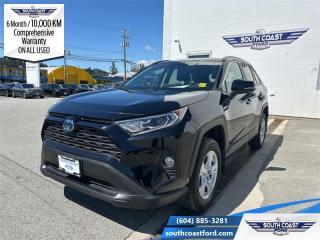 <b>Sunroof,  Heated Steering Wheel,  Power Liftgate,  Heated Seats,  Aluminum Wheels!</b><br> <br> <p style=color:Blue;><b>Upgrade your ride at South Coast Ford with peace of mind! Our used vehicles come with a minimum of 10,000 km and 6 months of Comprehensive Vehicle Warranty. Drive with confidence knowing your investment is protected.</b></p><br> <br> Compare at $42220 - Our Price is just $40990! <br> <br>   Radical design, refined drive-ability, and rugged capability make for an exciting adventure in the Toyota RAV4. This  2021 Toyota RAV4 is fresh on our lot in Sechelt. <br> <br>Introducing the Toyota RAV4, a radical redesign of a storied legend. While the RAV4 is loaded with modern creature comforts, conveniences, and safety, this SUV is still true to its roots with incredible capability. Whether youre running errands in the city or exploring the countryside, the RAV4 empowers your ambitions and redefines what you can do. Make new and exciting memories in this ultra efficient Toyota RAV4 today! This  SUV has 60,454 kms. Its  midnight black metallic in colour  . It has a cvt transmission and is powered by a  219HP 2.5L 4 Cylinder Engine.  This unit has some remaining factory warranty for added peace of mind. <br> <br> Our RAV4s trim level is Hybrid XLE. Stepping up to this luxurious all-wheel drive RAV4 Hybrid XLE is an excellent choice as it comes with premium features such as a power sunroof, dual zone climate control, Toyotas Smart Key system with push button start, a 7 inch touchscreen with Entune Audio 3.0, Apple CarPlay, Android Auto, extra USB and aux inputs, heated seats with more premium seat material, a leather heated steering wheel and stylish aluminum wheels. Additional features includes a power drivers seat, LED headlights, fog lights, heated power mirrors, Toyota Safety Sense 2.0, dynamic radar cruise control, automatic highbeam assist, blind spot monitoring with rear cross traffic alert, and lane keep assist with lane departure warning plus so much more. This vehicle has been upgraded with the following features: Sunroof,  Heated Steering Wheel,  Power Liftgate,  Heated Seats,  Aluminum Wheels,  Apple Carplay,  Android Auto. <br> <br>To apply right now for financing use this link : <a href=https://www.southcoastford.com/financing/ target=_blank>https://www.southcoastford.com/financing/</a><br><br> <br/><br> Buy this vehicle now for the lowest bi-weekly payment of <b>$280.70</b> with $0 down for 96 months @ 8.99% APR O.A.C. ( Plus applicable taxes -  $595 Administration Fee included    / Total Obligation of $58385  ).  See dealer for details. <br> <br>Call South Coast Ford Sales or come visit us in person. Were convenient to Sechelt, BC and located at 5606 Wharf Avenue. and look forward to helping you with your automotive needs.<br><br> Come by and check out our fleet of 20+ used cars and trucks and 110+ new cars and trucks for sale in Sechelt.  o~o