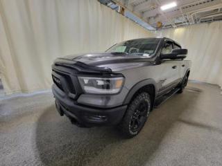 Like a brand-new 2023 Ram 1500 Rebel Night Crew Cab 4X4 with no accident history and Panoramic Sunroof, BlindSpot and CrossPath Detection, Class IV Hitch Receiver and Trailer Brake Control. No more waiting! Dial our number or Message us to come and check out this Beautiful Truck today!

Key Features:
FullSpeed Forward Collision Warning Plus
ParkView Rear Back-Up Camera
Hill Start Assis
Head-Up Display
Front Heated/ Ventilated Seats
Heated Second Row Seats
Heated Steering Wheel
Wireless Charging Pad  Pedestrian Emergency Braking
Lane Keep Assis
Adaptive Cruise Control w/ Stop & Go
Pickup Box Lighting
Mopar Deployable Bed Step
Uconnect 5W NAV with 12inch display
Remote Start System
And More

After this vehicle came in on trade, we had our fully certified Pre-Owned Ford mechanic perform a mechanical inspection. This vehicle passed the certification with flying colors. After the mechanical inspection and work was finished, we did a complete detail including sterilization and carpet shampoo.

Bennett Dunlop Ford has been located at 770 Broad St, in the heart of Regina for over 40 years! Our 4.6 Star google review (Well over 1,800 reviews) is the result of our commitment to providing the fastest, easiest and most fun guest experience possible. Our guests tell us that they love that we don't charge any admin or documentation fees, our sales team will simply offer our best price upfront and we have a no-questions-asked money back guarantee just in case you change your mind after your purchase.