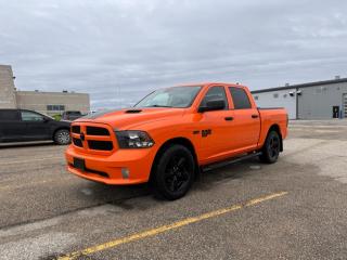 <b>Aluminum Wheels,  Fog Lamps,  Rear Camera,  Cruise Control,  Air Conditioning!</b><br> <br>    Few vehicles have such broad appeal as a full-size pickup and the Ram 1500 Classic is no exception, says Car and Driver. This  2019 Ram 1500 Classic is fresh on our lot in Selkirk. <br> <br>The reasons why this Ram 1500 Classic stands above its well-respected competition are evident: uncompromising capability, proven commitment to safety and security, and state-of-the-art technology. From its muscular exterior to the well-trimmed interior, this 2019 Ram 1500 Classic is more than just a workhorse. Get the job done in comfort and style while getting a great value with this amazing full size truck. This  Crew Cab 4X4 pickup  has 76,857 kms. Its  orange in colour  . It has an automatic transmission and is powered by a  395HP 5.7L 8 Cylinder Engine.  It may have some remaining factory warranty, please check with dealer for details. <br> <br> Our 1500 Classics trim level is Express. Upgrading to this 1500 Classic Express is a great choice as this hard working truck comes loaded with stylish aluminum wheels, body colored bumpers, front fog lights, heavy-duty shock absorbers, electronic stability control and trailer sway control. Additional features include ParkView rear back-up camera, cruise control, air conditioning, an infotainment hub with SiriusXM, radio 3.0 and a USB port, automatic headlights, power windows, power doors, and more. This vehicle has been upgraded with the following features: Aluminum Wheels,  Fog Lamps,  Rear Camera,  Cruise Control,  Air Conditioning,  Power Windows,  Power Doors. <br> To view the original window sticker for this vehicle view this <a href=http://www.chrysler.com/hostd/windowsticker/getWindowStickerPdf.do?vin=1C6RR7KT5KS611105 target=_blank>http://www.chrysler.com/hostd/windowsticker/getWindowStickerPdf.do?vin=1C6RR7KT5KS611105</a>. <br/><br> <br>To apply right now for financing use this link : <a href=https://www.selkirkchevrolet.com/pre-qualify-for-financing/ target=_blank>https://www.selkirkchevrolet.com/pre-qualify-for-financing/</a><br><br> <br/><br>Selkirk Chevrolet Buick GMC Ltd carries an impressive selection of new and pre-owned cars, crossovers and SUVs. No matter what vehicle you might have in mind, weve got the perfect fit for you. If youre looking to lease your next vehicle or finance it, we have competitive specials for you. We also have an extensive collection of quality pre-owned and certified vehicles at affordable prices. Winnipeg GMC, Chevrolet and Buick shoppers can visit us in Selkirk for all their automotive needs today! We are located at 1010 MANITOBA AVE SELKIRK, MB R1A 3T7 or via phone at 204-482-1010.<br> Come by and check out our fleet of 80+ used cars and trucks and 170+ new cars and trucks for sale in Selkirk.  o~o