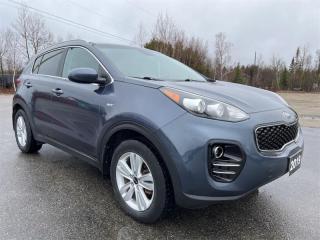 <b>Trade-in, Non-smoker, One Owner, Local, Low Mileage, Air, Rear Air, Tilt, Cruise!</b><br> <br>  Compare at $20780 - Kia of Timmins is just $19981! <br> <br>   This Kia Sportage is the best performer in its class, offering loads of luxuries and and a capable ride for a very reasonable price tag. This  2019 Kia Sportage is fresh on our lot in Timmins. <br> <br>This 2019 Kia Sportage ranks as one of the best Crossover SUVs and with a good set of reasons. It has one of the best interiors in its class, a generous cargo space, excellent power and handling, and a modern, distinctive, ageless design. Comfortable, composed and highly capable on the road and for light off-roading, this Kia Sportage definitely deserves your consideration.This  SUV has 81,664 kms. Its  blue in colour  . It has a 6 speed automatic transmission and is powered by a  181HP 2.4L 4 Cylinder Engine.  It may have some remaining factory warranty, please check with dealer for details. <br> <br> Our Sportages trim level is LX AWD. This capable Kia Sportage LX AWD comes loaded with features such as aluminum wheels, a 6 speaker stereo system, Bluetooth streaming audio and a 5 inch display, USB connectivity, SiriusXM satellite radio, heated front bucket seats, remote keyless entry, cruise control, remote keyless entry, power windows, a back up camera and plenty more safety and comfort features. This vehicle has been upgraded with the following features: Air, Rear Air, Tilt, Cruise, Power Windows, Power Locks, Power Mirrors. <br> <br>To apply right now for financing use this link : <a href=https://www.kiaoftimmins.com/timmins-ontario-car-loan-application target=_blank>https://www.kiaoftimmins.com/timmins-ontario-car-loan-application</a><br><br> <br/><br> Buy this vehicle now for the lowest bi-weekly payment of <b>$148.11</b> with $0 down for 84 months @ 8.99% APR O.A.C. ( Plus applicable taxes -  Plus applicable fees   / Total Obligation of $26957  ).  See dealer for details. <br> <br>As a local, family owned and operated dealership we look to be your number one place to buy your new vehicle! Kia of Timmins has been serving a large community across northern Ontario since 2001 and focuses highly on customer satisfaction. Our #1 priority is to make you feel at home as soon as you step foot in our dealership. Family owned and operated, our business is in Timmins, Ontario the city with the heart of gold. Also positioned near many towns in which we service such as: South Porcupine, Porcupine, Gogama, Foleyet, Chapleau, Wawa, Hearst, Mattice, Kapuskasing, Moonbeam, Fauquier, Smooth Rock Falls, Moosonee, Moose Factory, Fort Albany, Kashechewan, Abitibi Canyon, Cochrane, Iroquois falls, Matheson, Ramore, Kenogami, Kirkland Lake, Englehart, Elk Lake, Earlton, New Liskeard, Temiskaming Shores and many more.We have a fresh selection of new & used vehicles for sale for you to choose from. If we dont have what you need, we can find it! All makes and models are within our reach including: Dodge, Chrysler, Jeep, Ram, Chevrolet, GMC, Ford, Honda, Toyota, Hyundai, Mitsubishi, Nissan, Lincoln, Mazda, Subaru, Volkswagen, Mini-vans, Trucks and SUVs.<br><br>We are located at 1285 Riverside Drive, Timmins, Ontario. Too far way? We deliver anywhere in Ontario and Quebec!<br><br>Come in for a visit, call 1-800-661-6907 to book a test drive or visit <a href=https://www.kiaoftimmins.com>www.kiaoftimmins.com</a> for complete details. All prices are plus HST and Licensing.<br><br>We look forward to helping you with all your automotive needs!<br> o~o