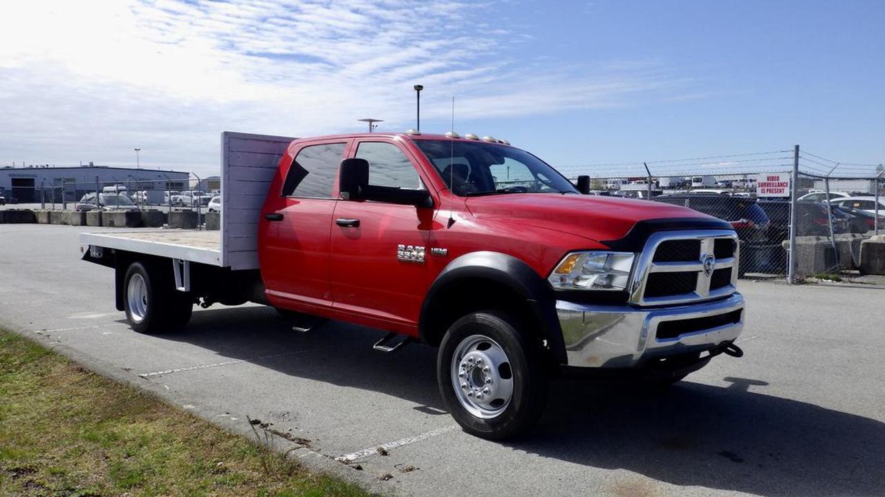 2015 RAM 5500 Crew Cab  12 Foot Flatdeck 4WD Dually, 6.4L V8 OHV 16V engine, 4 door, Automatic, 4WD, Red exterior.Bluetooth, Aux, USB, Power Windows, Power Locks,Power Mirrors, Trailer Brake Controller, Tow/Haul Mode, 4WD Selector, Tow Mirrors, Side Steps, Flat Deck Ratchets. Dimensions of Deck Length 12 Feet Width 8 Feet. Certificate and Decal Valid to April 2025  $36,710.00 plus $375 processing fee, $37,085.00 total payment obligation before taxes.   Listing report, warranty, contract commitment cancellation fee, financing available on approved credit (some limitations and exceptions may apply). All above specifications and information is considered to be accurate but is not guaranteed and no opinion or advice is given as to whether this item should be purchased. We do not allow test drives due to theft, fraud, acts of vandalism and undetectable impaired driving. Instead we provide the following benefits: Complimentary Warranty (with options to extend), Limited Money Back Satisfaction Guarantee on Fully Completed Contracts, Contract Commitment Cancellation, and an Open-Ended Sell-Back Option. Ask seller for details or call 604-522-REPO(7376) to confirm listing availability.