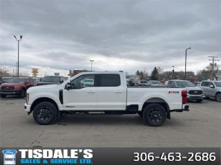 <b>Low Mileage, Navigation,  Leather Seats,  Cooled Seats,  B&O Sound System,  Remote Start!</b><br> <br> Check out the large selection of pre-owned vehicles at Tisdales today!<br> <br>   Brutish power and payload capacity are key traits of this Ford F-350, while aluminum construction brings it into the 21st century. This  2023 Ford F-350 Super Duty is fresh on our lot in Kindersley. <br> <br>The most capable truck for work or play, this heavy-duty Ford F-350 never stops moving forward and gives you the power you need, the features you want, and the style you crave! With high-strength, military-grade aluminum construction, this F-350 Super Duty cuts the weight without sacrificing toughness. The interior design is first class, with simple to read text, easy to push buttons and plenty of outward visibility. This truck is strong, extremely comfortable and ready for anything. This low mileage  sought after diesel Crew Cab 4X4 pickup  has just 13,125 kms. Its  star white metallic tri-coat in colour  . It has a 10 speed automatic transmission and is powered by a  475HP 6.7L 8 Cylinder Engine. <br> <br> Our F-350 Super Dutys trim level is Lariat. Experience rugged capability and luxury in this F-350 Lariat trim, which features leather-trimmed heated and ventilated front seats with power adjustment, memory function and lumbar support, a heated leather-wrapped steering wheel, voice-activated dual-zone automatic climate control, power-adjustable pedals, a sonorous 8-speaker Bang & Olufsen audio system, and two 120-volt AC power outlets. This truck is also ready to get busy, with equipment such as class V towing equipment with a hitch, trailer wiring harness, a brake controller and trailer sway control, beefy suspension with heavy duty shock absorbers, power extendable trailer style mirrors, and LED headlights with front fog lamps and automatic high beams. Connectivity is handled by a 12-inch infotainment screen powered by SYNC 4, bundled with Apple CarPlay, Android Auto, inbuilt navigation, and SiriusXM satellite radio. Safety features also include Ford Co-Pilot360 with a surround camera and pre-collision assist with automatic emergency braking and cross-traffic alert, blind spot detection, rear parking sensors, forward collision mitigation, and a cargo bed camera. This vehicle has been upgraded with the following features: Navigation,  Leather Seats,  Cooled Seats,  B&o Sound System,  Remote Start,  Climate Control,  Proximity Key. <br> To view the original window sticker for this vehicle view this <a href=http://www.windowsticker.forddirect.com/windowsticker.pdf?vin=1FT8W3BT6PED51700 target=_blank>http://www.windowsticker.forddirect.com/windowsticker.pdf?vin=1FT8W3BT6PED51700</a>. <br/><br> <br>To apply right now for financing use this link : <a href=http://www.tisdales.com/shopping-tools/apply-for-credit.html target=_blank>http://www.tisdales.com/shopping-tools/apply-for-credit.html</a><br><br> <br/><br>Tisdales is not your standard dealership. Sales consultants are available to discuss what vehicle would best suit the customer and their lifestyle, and if a certain vehicle isnt readily available on the lot, one will be brought in. o~o