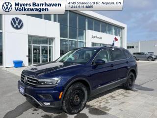 <b>Sunroof,  Leather Seats,  Navigation,  Premium Audio,  Power Liftgate!</b><br> <br>    The VW Tiguan aces real-world utility with its excellent outward vision, comfortable interior, and supreme on road capabilities. This  2021 Volkswagen Tiguan is fresh on our lot in Nepean. <br> <br>The weekend warrior! As one of the most minimalist styled crossover SUVs, this Tiguan is the winner of elegance in its competition. Crisp lines, a luxurious ride quality and the largest interior within its class give this Tiguan the high marks as the leader of the crossover SUV segment.This  SUV has 59,594 kms. Its  atlantic blue in colour  . It has an automatic transmission and is powered by a  184HP 2.0L 4 Cylinder Engine.  This unit has some remaining factory warranty for added peace of mind. <br> <br> Our Tiguans trim level is Highline 4MOTION. This range topping Tiguan Highline comes fully loaded with unique alloy wheels, a premium Fender audio system, panoramic sunroof, satellite navigation, a heated leather steering wheel and heated leather seats, forward collision warning, and autonomous emergency braking. It also includes blind spot detection, chrome exterior trim, a 8 inch touchscreen display, App-Connect smartphone integration Apple CarPlay, Android Auto and streaming audio, distance pacing w/traffic stop-go cruise, remote keyless entry, 360 camera, lane departure warning and much more. This vehicle has been upgraded with the following features: Sunroof,  Leather Seats,  Navigation,  Premium Audio,  Power Liftgate,  Heated Steering Wheel,  Heated Seats. <br> <br>To apply right now for financing use this link : <a href=https://www.barrhavenvw.ca/en/form/new/financing-request-step-1/44 target=_blank>https://www.barrhavenvw.ca/en/form/new/financing-request-step-1/44</a><br><br> <br/><br> Buy this vehicle now for the lowest bi-weekly payment of <b>$185.63</b> with $0 down for 96 months @ 7.99% APR O.A.C. ((Plus applicable taxes and fees - Some conditions apply to get approved at the mentioned rate)     ).  See dealer for details. <br> <br>We are your premier Volkswagen dealership in the region. If youre looking for a new Volkswagen or a car, check out Barrhaven Volkswagens new, pre-owned, and certified pre-owned Volkswagen inventories. We have the complete lineup of new Volkswagen vehicles in stock like the GTI, Golf R, Jetta, Tiguan, Atlas Cross Sport, Volkswagen ID.4 electric vehicle, and Atlas. If you cant find the Volkswagen model youre looking for in the colour that you want, feel free to contact us and well be happy to find it for you. If youre in the market for pre-owned cars, make sure you check out our inventory. If you see a car that you like, contact 844-914-4805 to schedule a test drive.<br> Come by and check out our fleet of 40+ used cars and trucks and 90+ new cars and trucks for sale in Nepean.  o~o
