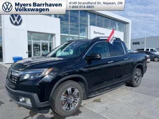 <b>Navigation,  Sunroof,  Leather Seats,  Adaptive Cruise Control,  Bluetooth!</b><br> <br>    The Honda Ridgeline is not your average pickup truck. It matches the toughness of its rivals while giving you vastly superior comfort and driveability. This  2017 Honda Ridgeline is fresh on our lot in Nepean. <br> <br>Honda threw out the rulebook with the Ridgeline and made a totally unconventional pickup truck. It has all the utility of a pickup combined with car-like ride quality. Its unique unibody design gives it excellent road manners and a smooth ride while maintaining the hard-working functionality of a truck. Theres never been a pickup thats easier to drive. Packed with quirks, versatility, and character the Honda Ridgeline is one of a kind. This  Crew Cab 4X4 pickup  has 113,303 kms. Its  crystal black pearl in colour  . It has an automatic transmission and is powered by a  280HP 3.5L V6 Cylinder Engine.  <br> <br> Our Ridgelines trim level is Touring. Youll be amazed by the top of the line Touring trim. It comes with a display audio system with Bluetooth, SiriusXM, navigation, and 8 speaker premium audio, 4 USB ports, a truck bed audio system, heated and ventilated leather seats, memory drivers seat and mirrors, integrated LED bed lights, a power moonroof, a rear view camera, LaneWatch blind spot detection, forward collision warning, adaptive cruise control, and much more. This vehicle has been upgraded with the following features: Navigation,  Sunroof,  Leather Seats,  Adaptive Cruise Control,  Bluetooth,  Rear View Camera,  Premium Sound Package. <br> <br>To apply right now for financing use this link : <a href=https://www.barrhavenvw.ca/en/form/new/financing-request-step-1/44 target=_blank>https://www.barrhavenvw.ca/en/form/new/financing-request-step-1/44</a><br><br> <br/><br> Buy this vehicle now for the lowest bi-weekly payment of <b>$222.62</b> with $0 down for 84 months @ 7.99% APR O.A.C. ((Plus applicable taxes and fees - Some conditions apply to get approved at the mentioned rate)     ).  See dealer for details. <br> <br>We are your premier Volkswagen dealership in the region. If youre looking for a new Volkswagen or a car, check out Barrhaven Volkswagens new, pre-owned, and certified pre-owned Volkswagen inventories. We have the complete lineup of new Volkswagen vehicles in stock like the GTI, Golf R, Jetta, Tiguan, Atlas Cross Sport, Volkswagen ID.4 electric vehicle, and Atlas. If you cant find the Volkswagen model youre looking for in the colour that you want, feel free to contact us and well be happy to find it for you. If youre in the market for pre-owned cars, make sure you check out our inventory. If you see a car that you like, contact 844-914-4805 to schedule a test drive.<br> Come by and check out our fleet of 40+ used cars and trucks and 90+ new cars and trucks for sale in Nepean.  o~o