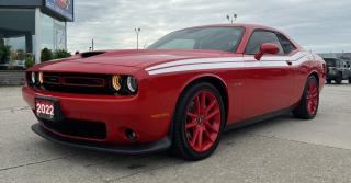 <p style=text-align: center;><strong><span style=font-size: 18pt;>2022 DODGE CHALLENGER R/T RWD</span></strong></p><p style=text-align: center;><strong><span style=font-size: 18pt;>5.7L HEMI VVT V8 ENGINE WITH FUELSAVER MDS</span></strong></p><p style=text-align: center;><span style=font-size: 14pt;>375 HORSEPOWER | 410 LB-FT OF TORQUE</span></p><p style=text-align: center;><span style=font-size: 14pt;>9.4L/100KM HIGHWAY | 14.7L/100KM CITY | 12.3L/100KM COMBINED</span></p><p style=text-align: center;><strong><span style=font-size: 18pt;>8–SPEED TORQUEFLITE AUTOMATIC TRANSMISSION  </span></strong></p><p style=text-align: center;><strong><span style=font-size: 18pt;>20 MACHINED ALUMINUM WHEELS W/ GRANITE POCKETS</span></strong></p><p style=text-align: center;> </p><p style=text-align: center;><strong><span style=font-size: 14pt;>FUNCTIONAL / SAFETY  FEATURES</span></strong></p><p style=text-align: center;><span style=font-size: 14pt;>Active head restraints, Advanced multistage front air bags, Supplemental side curtain air bags, Supplemental front seat–mounted side air bags, Active exhaust, All–Speed Traction Control, Anti–spin differential rear axle, Electronic Roll Mitigation, Electronic Stability Control, High–speed engine controller, Performance 4–wheel anti–lock disc brakes, Performance steering, Push–button start, Remote proximity keyless entry, Sport mode, Super Track Pak, Tire pressure monitoring system, Tire service kit, Automatic headlamps, Rain–sensing windshield wipers, ParkView Rear Back–Up Camera, Park–Sense Rear Park Assist System, A/C with dual–zone automatic temperature control, Power 6–way adjustable driver seat, Rear 60/40 split–folding bench seat, Leather–wrapped performance steering wheel, Steering wheel–mounted audio controls, Leather–wrapped shift knob, Google Android Auto, Apple CarPlay capable, Hands–free phone communication, Media hub w/ 2 USB ports and auxiliary input jack</span></p><p style=text-align: center;> </p><p style=text-align: center;><strong><span style=font-size: 14pt;>OPTIONAL EQUIPMENT</span></strong></p><p style=text-align: center;><span style=font-size: 14pt;><em><span style=text-decoration: underline;>Plus Group:</span></em><br />Nappa leather/Alcantara–faced front vented seats, Front ventilated seats, Premium–stitched dash panel, Dodge Performance Pages, Front heated seats, Radio, driver seat and mirrors with memory settings, Heated steering wheel, 6 Alpine speakers, 276–watt amplifier, HD radio , 8.4–inch touchscreen, Shark fin antenna, SiriusXM satellite radio capable, 4G LTE Wi–Fi hot spot, Power tilt/telescoping steering column, 20x8–in machined aluminum wheels w/ Granite pockets            </span></p><p style=text-align: center;><span style=font-size: 14pt;><em><span style=text-decoration: underline;>Driver Convenience Group:</span></em><br />Body–colour, power, heated, manual folding mirrors, Rhombi illuminated, Air Catcher headlamp, High intensity discharge (HID) headlamps, Deluxe Security Alarm, Blind–Spot Monitoring w/ Rear Cross–Path Detection, Locking lug nuts, 8–speed TorqueFlite automatic transmission, Leather–wrapped shift knob, Auto/Stick automatic transmission, 3.07 rear axle ratio, Conventional differential rear axle, Remote start system, Tip start, Steering wheel–mounted shift control</span></p><p style=text-align: center;><em><span style=text-decoration: underline;><span style=font-size: 14pt;>Power sunroof</span></span></em></p><p style=text-align: center;><span style=font-size: 14pt;><em><span style=text-decoration: underline;>Uconnect 4C NAV with 8.4–inch display:</span></em><br />GPS navigation, SiriusXM Travel Link, SiriusXM Traffic, 5–year SiriusXM Travel Link subscription</span></p><p style=text-align: center;> </p><p style=text-align: center;> </p><p style=box-sizing: border-box; margin-bottom: 1rem; margin-top: 0px; color: #212529; font-family: -apple-system, BlinkMacSystemFont, Segoe UI, Roboto, Helvetica Neue, Arial, Noto Sans, Liberation Sans, sans-serif, Apple Color Emoji, Segoe UI Emoji, Segoe UI Symbol, Noto Color Emoji; font-size: 16px; background-color: #ffffff; text-align: center; line-height: 1;><span style=box-sizing: border-box; font-family: arial, helvetica, sans-serif;><span style=box-sizing: border-box; font-weight: bolder;><span style=box-sizing: border-box; font-size: 14pt;>Here at Lanoue/Amfar Sales, Service & Leasing in Tilbury, we take pride in providing the public with a wide variety of High-Quality Pre-owned Vehicles. We recondition and certify our vehicles to a level of excellence that exceeds the Status Quo. We treat our Customers like family and provide the highest level of service from Start to Finish. If you’d like a smooth & stress-free car shopping experience, give one of our Sales Associates a call at 1-844-682-3325 to help you find your next NEW-TO-YOU vehicle!</span></span></span></p><p style=box-sizing: border-box; margin-bottom: 1rem; margin-top: 0px; color: #212529; font-family: -apple-system, BlinkMacSystemFont, Segoe UI, Roboto, Helvetica Neue, Arial, Noto Sans, Liberation Sans, sans-serif, Apple Color Emoji, Segoe UI Emoji, Segoe UI Symbol, Noto Color Emoji; font-size: 16px; background-color: #ffffff; text-align: center; line-height: 1;><span style=box-sizing: border-box; font-family: arial, helvetica, sans-serif;><span style=box-sizing: border-box; font-weight: bolder;><span style=box-sizing: border-box; font-size: 14pt;>Although we try to take great care in being accurate with the information in this listing, from time to time, errors occur. The vehicle is priced as it is physically equipped. Minor variances will not effect pricing. Please verify the vehicle is As Expected when you visit. Thank You!</span></span></span></p>