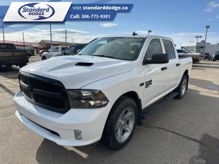 <b>Express Value Package, Sub Zero Package, Mopar Sport Performance Hood, Running Boards , Trailer Hitch!</b><br> <br>  Compare at $37582 - Our Price is just $36850! <br> <br>   This 2021 Ram 1500 Classic is the truck to have, thanks to its incredible powertrain and a well-appointed interior. This  2021 Ram 1500 Classic is fresh on our lot in Swift Current. MudflapsThis  Crew Cab 4X4 pickup  has 81,004 kms. Its  bright white in colour  . It has a 8 speed automatic transmission and is powered by a  395HP 5.7L 8 Cylinder Engine.  This unit has some remaining factory warranty for added peace of mind. <br> <br> Our 1500 Classics trim level is Express. Upgrading to this rugged 1500 Classic Express is a great choice as it comes loaded with stylish aluminum wheels, body colored bumpers, front fog lights, heavy-duty shock absorbers, electronic stability control and trailer sway control. Additional features include ParkView rear back-up camera, cruise control, air conditioning, an infotainment hub with SiriusXM, radio 3.0 and a USB port, automatic headlights, power windows, power doors, and more. This vehicle has been upgraded with the following features: Express Value Package, Sub Zero Package, Mopar Sport Performance Hood, Running Boards , Trailer Hitch. <br> To view the original window sticker for this vehicle view this <a href=http://www.chrysler.com/hostd/windowsticker/getWindowStickerPdf.do?vin=3C6RR7KT7MG615246 target=_blank>http://www.chrysler.com/hostd/windowsticker/getWindowStickerPdf.do?vin=3C6RR7KT7MG615246</a>. <br/><br> <br>To apply right now for financing use this link : <a href=https://standarddodge.ca/financing target=_blank>https://standarddodge.ca/financing</a><br><br> <br/><br>* Stop By Today *Test drive this must-see, must-drive, must-own beauty today at Standard Chrysler Dodge Jeep Ram, 208 Cheadle St W., Swift Current, SK S9H0B5! <br><br> Come by and check out our fleet of 30+ used cars and trucks and 90+ new cars and trucks for sale in Swift Current.  o~o