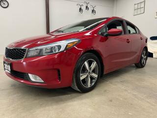 <p>In the market for reasonably priced, certified transportation?  Look no further.  This nifty little 4 door/5 seater sedan is the answer.  This 2018, 2.0 liter 4 cylinder front wheel drive Kia Forte is a fabulous option at only $11,872 (pls tax and plates).  This vehicle is in phenomenal shape - has been well maintained and is a single owner/locally owned vehicle and is accident free.  Its got some nice features including heated seats, a large display screen , back up camera, satellite radio, rubber mats and more....financing available!!!!</p><p>All Vehicles are Sold Certified and come with a 3 month/3,000 km 1-Star Powertrain Drive Global Warranty (extended warranties and coverages available). </p><p>At LuckyDog we believe in transparency, thats why all our vehicles come with a complete CarFax Vehicle report to ensure your not buying a salvaged or rebuilt vehicle. </p><p>* While every reasonable effort is made to ensure the accuracy of this information, some vehicle information may not be exactly as shown. </p>