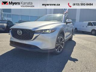 <b>Low Mileage, Power Liftgate,  Heated Steering Wheel,  Heated Seats,  Android Auto,  Apple CarPlay!</b><br> <br>  Compare at $33989 - Our Price is just $32999! <br> <br>   This Mazda CX-5s interior is one of the best in the class, offering great versatility and excellent fit and finish. This  2022 Mazda CX-5 is fresh on our lot in Kanata. <br> <br>The 2022 CX-5 strengthens the connection between vehicle and driver. Mazda designers and engineers carefully consider every element of the vehicles makeup to ensure that the CX-5 outperforms expectations and elevates the experience of driving. Powerful and precise, yet comfortable and connected, the 2022 CX-5 is purposefully designed for drivers, no matter what the conditions might be. This low mileage  SUV has just 25,625 kms. Its  sonic silver metallic in colour  . It has an automatic transmission and is powered by a  2.5L I4 16V GDI DOHC engine. <br> <br> Our CX-5s trim level is GS. This GS really ups the comfort and convenience with features like a power liftgate, heated steering wheel, and synthetic leather upholstery. This CX-5 comes with heated seats for a cozy cabin, alongside Android Auto, Apple CarPlay, and even more infotainment tech for endless engagement. An assistive suite helps you stay safe with lane keep assist, blind spot monitoring, and distance pacing cruise with stop and go. Fog lamps help on those dreary days, while a rearview camera makes sure you always park safely. Do it all in style with chrome trim and aluminum wheels. This vehicle has been upgraded with the following features: Power Liftgate,  Heated Steering Wheel,  Heated Seats,  Android Auto,  Apple Carplay,  Lane Keep Assist,  Blind Spot Detection. <br> <br>To apply right now for financing use this link : <a href=https://www.myersvw.ca/en/form/new/financing-request-step-1/44 target=_blank>https://www.myersvw.ca/en/form/new/financing-request-step-1/44</a><br><br> <br/><br>Backed by Myers Exclusive NO Charge Engine/Transmission for life program lends itself for your peace of mind and you can buy with confidence. Call one of our experienced Sales Representatives today and book your very own test drive! Why buy from us? Move with the Myers Automotive Group since 1942! We take all trade-ins - Appraisers on site - Full safety inspection including e-testing and professional detailing prior delivery! Every vehicle comes with a free Car Proof History report.<br><br>*LIFETIME ENGINE TRANSMISSION WARRANTY NOT AVAILABLE ON VEHICLES MARKED AS-IS, VEHICLES WITH KMS EXCEEDING 140,000KM, VEHICLES 8 YEARS & OLDER, OR HIGHLINE BRAND VEHICLES (eg.BMW, INFINITI, CADILLAC, LEXUS...). FINANCING OPTIONS NOT AVAILABLE ON VEHICLES MARKED AS-IS OR AS-TRADED.<br> Come by and check out our fleet of 40+ used cars and trucks and 120+ new cars and trucks for sale in Kanata.  o~o