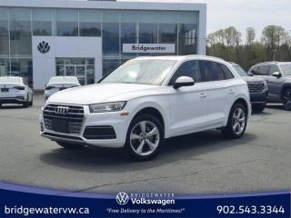 New Price! Recent Arrival! White 2019 Audi Q5 45 Progressiv quattro | Apple Carplay | Android Auto | Sirus XM quattro 7-Speed Automatic S tronic 2.0L 4-Cylinder TFSI Bridgewater Volkswagen, Located in Bridgewater Nova Scotia.Black Leather, 10 Speakers, 4-Wheel Disc Brakes, 5.302 Axle Ratio, ABS brakes, Air Conditioning, Alloy wheels, AM/FM radio: SiriusXM, Audi smartphone interface (Apple CarPlay/Android Auto), Auto-dimming door mirrors, Auto-dimming Rear-View mirror, Automatic temperature control, Brake assist, Bumpers: body-colour, Compass, Delay-off headlights, Driver door bin, Driver vanity mirror, Dual front impact airbags, Dual front side impact airbags, Electronic Stability Control, Exterior Parking Camera Rear, Four wheel independent suspension, Front anti-roll bar, Front Bucket Seats, Front dual zone A/C, Front fog lights, Front reading lights, Garage door transmitter: HomeLink, Heated door mirrors, Heated Front Bucket Seats, Heated front seats, Heated steering wheel, High intensity discharge headlights: Xenon plus, Illuminated entry, Leather Seating Surfaces, Leather Shift Knob, Leather steering wheel, Low tire pressure warning, Memory seat, Navigation System, Occupant sensing airbag, Outside temperature display, Overhead airbag, Overhead console, Panic alarm, Passenger door bin, Passenger vanity mirror, Power door mirrors, Power driver seat, Power Liftgate, Power moonroof, Power passenger seat, Power steering, Power windows, Radio data system, Radio: MMI Navigation Plus w/8.3 Display/SiriusXM, Rain sensing wipers, Rear air conditioning, Rear anti-roll bar, Rear fog lights, Rear reading lights, Rear window defroster, Rear window wiper, Remote keyless entry, Security system, Speed control, Speed-sensing steering, Speed-Sensitive Wipers, Split folding rear seat, Spoiler, Steering wheel mounted audio controls, Tachometer, Telescoping steering wheel, Tilt steering wheel, Traction control, Trip computer, Turn signal indicator mirrors, Variably intermittent wipers.Certification Program Details: 150 Points Inspection Fresh Oil Change Free Carfax Full Detail 2 years MVI Full Tank of Gas The 150+ point inspection includes: Engine Instrumentation Interior components Pre-test drive inspections The test drive Service bay inspection Appearance Final inspection