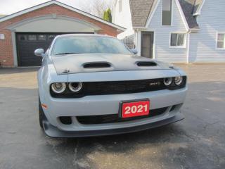 <p>NEW INVENTORY ALERT!</p><p style=text-align: center;><span style=text-decoration: underline;><strong>2021 DODGE CHALLENGER SRT : SUPER STOCK HELL CAT REDEYE</strong></span></p><p style=text-align: center;><strong>ONLY 4,800 KMS!!!!</strong></p><p style=text-align: center;><strong>VERY RARE!!! LESS THAN 15 IN CANADA, TOTAL WORLD PRODUCTION WAS 590!</strong></p><p style=text-align: center;><strong>ORIGINAL 1 OWNER</strong></p><p style=text-align: center;><strong>SMOKE GREY COLOUR </strong></p><p style=text-align: center;><strong>WIDE BODY </strong></p><p style=text-align: center;><strong>6.2 SUPERCHARGER </strong></p><p style=text-align: center;><strong>807 WHEEL HORSE POWER </strong></p><p style=text-align: center;><strong>AUTOMATIC </strong></p><p style=text-align: center;><strong>EXTENDED WARRANTY </strong></p><p style=text-align: center;> </p><p style=text-align: center;><span style=text-decoration: underline;><strong>ASKING $149,900.00 </strong></span></p><p> </p><p>The pricing listed above does NOT include HST and Licensing </p><p> </p><p>A carfax is also provided to verify prior maintenance, servicing, and/or accident reports and claims history. </p><p> </p><p>WE accept Bad Credit, Good Credit and NO CREDIT! </p><p> </p><p>Our business will expedite all public and private financial lender options to accommodate your financial needs if required to purchase the vehicle of your dreams!</p><p> </p><p>Various vehicle warranties are available upon request and purchase of the vehicle. </p><p> </p><p>We ensure complete customer satisfaction GUARANTEE! Our family owned and operated business has happily been servicing the NIAGARA, HAMILTON, HALTON, TORONTO and GTA region(s) for over 25 YEARS!</p><p> </p><p>If you are interested in/or require further information call us at (905) 572-5559 and book an appointment to view and test drive this vehicle with one of our trusted and OMVIC certified sales persons TODAY! </p><p> </p>