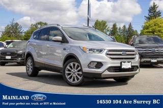 <p><strong><span style=font-family:Arial; font-size:18px;>Rev up your engine and take the wheel of your dream car at our automotive dealership today! Experience the pinnacle of comfort and capability with the 2017 Ford Escape Titanium, showcasing a sleek silver exterior, luxurious leather upholstery, and a host of advanced features designed to enhance your driving pleasure..</span></strong></p> <p><strong><span style=font-family:Arial; font-size:18px;>Dive into the details of this pre-owned gem that offers not just a ride, but a journey..</span></strong> <br> With 108,522 km on the odometer, this Ford Escape has been meticulously maintained to ensure it meets your highest standards.. The powerful 2.0L 4-cylinder engine paired with a smooth 6-speed automatic transmission offers both performance and efficiency, making it a smart choice for both city drives and country escapades.</p> <p><strong><span style=font-family:Arial; font-size:18px;>Equipped with top-tier options such as traction control, dual-zone automatic temperature control, and a rear exterior parking camera, this SUV is designed to prioritize your safety and comfort..</span></strong> <br> The comprehensive electronic stability controls and multiple airbags ensure peace of mind, while the heated door mirrors and automatic headlights add a layer of convenience to your daily travels.. Did you know that the Ford Escape was among the first SUVs to include knee airbags, a feature now considered pivotal for frontal crash protection? This 2017 model includes this safety innovation, reflecting Fords commitment to your well-being on the road.</p> <p><strong><span style=font-family:Arial; font-size:18px;>At Mainland Ford, we speak your language, ensuring that every question you have about this Ford Escape is answered..</span></strong> <br> Whether its about the cars history, features, or finance options, were here to help you make an informed decision.. Dont miss out on the chance to own the Ford Escape Titaniumwhere elegance meets exhilaration.</p> <p><strong><span style=font-family:Arial; font-size:18px;>Visit us at Mainland Ford and test drive your future car today!.</span></strong></p><hr />
<p><br />
<br />
To apply right now for financing use this link:<br />
<a href=https://www.mainlandford.com/credit-application/>https://www.mainlandford.com/credit-application</a><br />
<br />
Looking for a new set of wheels? At Mainland Ford, all of our pre-owned vehicles are Mainland Ford Certified. Every pre-owned vehicle goes through a rigorous 96-point comprehensive safety inspection, mechanical reconditioning, up-to-date service including oil change and professional detailing. If that isnt enough, we also include a complimentary Carfax report, minimum 3-month / 2,500 km Powertrain Warranty and a 30-day no-hassle exchange privilege. Now that is peace of mind. Buy with confidence here at Mainland Ford!<br />
<br />
Book your test drive today! Mainland Ford prides itself on offering the best customer service. We also service all makes and models in our World Class service center. Come down to Mainland Ford, proud member of the Trotman Auto Group, located at 14530 104 Ave in Surrey for a test drive, and discover the difference!<br />
<br />
*** All pre-owned vehicle sales are subject to a $699 documentation fee, $149 Fuel / E-Fill Surcharge, $599 Safety and Convenience Fee and $500 Finance Placement Fee (if applicable) plus applicable taxes. ***<br />
<br />
VSA Dealer# 40139</p>

<p>*All prices plus applicable taxes, applicable environmental recovery charges, documentation of $599 and full tank of fuel surcharge of $76 if a full tank is chosen. <br />Other protection items available that are not included in the above price:<br />Tire & Rim Protection and Key fob insurance starting from $599<br />Service contracts (extended warranties) for coverage up to 7 years and 200,000 kms starting from $599<br />Custom vehicle accessory packages, mudflaps and deflectors, tire and rim packages, lift kits, exhaust kits and tonneau covers, canopies and much more that can be added to your payment at time of purchase<br />Undercoating, rust modules, and full protection packages starting from $199<br />Financing Fee of $500 when applicable<br />Flexible life, disability and critical illness insurances to protect portions of or the entire length of vehicle loan</p>