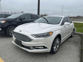 1 owner, safetied 2018 Ford Fusion Energi Titanium equipped with a 2.0L engine and an automatic transmission now available for sale at Kennedy Ford in Oakville, ON.Options include: 900A equipment group, power moonroof, heated/cooled front seats, navigation, lane keeping system, blind spot, remote vehicle start, and much more.Exterior: WhiteInterior: Black LeatherPerks of purchasing this vehicle from Kennedy Ford include: non-commission sales representatives, market value pricing, CarFax report with every vehicle, 3 years of tire insurance (we will repair or replace the tire from damage caused by things such as nails/screws), our vehicles come with a safety certificate, in addition to the safety inspection we also complete a 52 point inspection, we use all Ford genuine parts when completing work on the vehicle - no cheap aftermarket parts! Our vehicles also come fully detailed upon delivery.   We offer financing for clients with all types of credit; our on-site financial services managers work closely with 11 different financial institutions to obtain our clients loan approvals.Want more information or to book a test drive? Submit an inquiry.   Google score of 4.6 stars! Experience our family-owned and operated atmosphere for yourself at our full-service Ford Dealership.   We are located at the corner of Dorval & Wyecroft Road in beautiful Oakville, ON, just south of the QEW.   280-South Service Road West Oakville, ON.SALES HOURS: Monday - Thursday : 9:00am - 7:00pm Friday: 9:00am - 6:00pm Saturday: 9:00am - 5:00pm Sunday: CLOSED Appointments are recommended to ensure we have the vehicle ready for when you arrive.   Submit an inquiry to book an appointment.