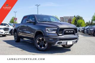 <p><strong><span style=font-family:Arial; font-size:18px;>Gratify in the luxury and performance that this exquisite 2019 RAM 1500 Rebel offers, featuring a Pano-Sunroof, 12 Screen, Navigation, and Backup capabilities..</span></strong></p> <p><span style=font-family:Arial; font-size:18px;>This pre-owned pickup is not just a vehicle; its a statement on wheels!

Step into a world where grey isnt just a colorits a badge of style and sophistication that complements the black interior to create an ambiance of understated elegance.. With only 44,728 km on the odometer, this robust RAM 1500 Rebel has barely flexed its muscles on the road.. Under the hood lies a powerful 5.7L 8Cyl engine paired with an 8-speed automatic transmission, ready to tackle any challenge, whether its a cruise through the city or a conquest in the countryside..</span></p> <p><span style=font-family:Arial; font-size:18px;>The crew cab ensures you and your crew enjoy every journey with ample space and comfort.. This RAM doesnt just help you navigate through roads but through life, thanks to its state-of-the-art navigation system.. The expansive 12-inch screen ensures all your maps and entertainment options are just a touch away, while the panoramic sunroof offers a glimpse of the sky, enhancing every ride with a touch of nature..</span></p> <p><span style=font-family:Arial; font-size:18px;>Safety and convenience are paramount in this model, featuring traction control, ABS brakes, and a suite of airbags ensuring peace of mind.. The backup camera acts as your trusted co-pilot, making parking and reversing as easy as a leisurely stroll in the park.. Dont just drive, glide! With features like power steering, heated door mirrors, and a leather steering wheel, every element is designed to enhance your driving experience..</span></p> <p><span style=font-family:Arial; font-size:18px;>The Rebel trim doesnt just meet expectations; it drives right over them with a bold two-tone paint finish and a trailer hitch receiver ready for action.. At Langley Chrysler, we dont just sell cars; we sell experiences.. Dont just love your car, love buying it! Come test drive this 2019 RAM 1500 Rebel today, and turn every journey into a cherished memory..</span></p> <p><span style=font-family:Arial; font-size:18px;>Your next adventure is just a key turn away!.</span></p>Documentation Fee $968, Finance Placement $628, Safety & Convenience Warranty $699

<p>*All prices plus applicable taxes, applicable environmental recovery charges, documentation of $599 and full tank of fuel surcharge of $76 if a full tank is chosen. <br />Other protection items available that are not included in the above price:<br />Tire & Rim Protection and Key fob insurance starting from $599<br />Service contracts (extended warranties) for coverage up to 7 years and 200,000 kms starting from $599<br />Custom vehicle accessory packages, mudflaps and deflectors, tire and rim packages, lift kits, exhaust kits and tonneau covers, canopies and much more that can be added to your payment at time of purchase<br />Undercoating, rust modules, and full protection packages starting from $199<br />Financing Fee of $500 when applicable<br />Flexible life, disability and critical illness insurances to protect portions of or the entire length of vehicle loan</p>