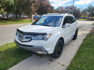 <div>FULLY LOADED 2007 ACURA MDX ELITE PACKAGE WITH DVD. LOADED WITH FEATURES</div><div>BROWN LEATHER INTERIOR</div><div>HEATED SEATS FRONT AND REAR</div><div>POWER AND MEMORY SEATS</div><div>NAVIGATION</div><div>REAR VIEW CAMERA</div><div>7 SEATS</div><div>DUAL CLIMATE CONTROL</div><div>TOW PACKAGE</div><div>UPGRADED RIMS</div><div>SUNROOF</div><div>REAR DVD</div><div><br /></div><div>Credit Cards Accepted</div><div><br /></div><div>Please call for more info and to book a test drive at 289-200-9805. Car-Fax is included in the asking price. Extended Warranties are also available. We offer financing too. Certification: Have your new pre-owned vehicle certified. We offer a full safety inspection including oil change, and professional detailing prior to delivery. Certification package is available for $699. All trade-ins are welcome. Taxes and licensing are extra.***</div>