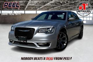 2018 Chrysler 300S | 3.6L V6 | Billet Metallic | S Appearance Package | Dual-pane Panoramic Sunroof | Uconnect 8.4" Touchscreen Display w/ Navigation | Heated Nappa Leather Seats | Heated Steering Wheel | Remote Start | Apple CarPlay & Android Auto | Remote Proximity Keyless Entry 

Elevate your driving experience with the 2018 Chrysler 300S, boasting a sleek Billet Metallic exterior and equipped with the dynamic S Appearance Package. Embrace luxury with heated Nappa leather seats and a heated steering wheel, ensuring comfort even on chilly days. Stay connected and entertained with the Uconnect 8.4" touchscreen display featuring navigation, Apple CarPlay, and Android Auto integration. Enjoy the convenience of remote start and remote proximity keyless entry, adding a touch of sophistication to every journey. With its dual-pane panoramic sunroof providing expansive views and a stylish exterior design, the Chrysler 300S offers a combination of refinement and performance thats sure to impress.
______________________________________________________

Engage & Explore with Peel Chrysler: Whether youre inquiring about our latest offers or seeking guidance, 1-866-652-6197 connects you directly. Dive deeper online or connect with our team to navigate your automotive journey seamlessly.

WE TAKE ALL TRADES & CREDIT. WE SHIP ANYWHERE IN CANADA! OUR TEAM IS READY TO SERVE YOU 7 DAYS! COME SEE WHY NOBODY BEATS A DEAL FROM PEEL! Your Source for ALL make and models used cars and trucks
______________________________________________________

*FREE CarFax (click the link above to check it out at no cost to you!)*

*FULLY CERTIFIED! (Have you seen some of these other dealers stating in their advertisements that certification is an additional fee? NOT HERE! Our certification is already included in our low sale prices to save you more!)

______________________________________________________

Peel Chrysler — A Trusted Destination: Based in Port Credit, Ontario, we proudly serve customers from all corners of Ontario and Canada including Toronto, Oakville, North York, Richmond Hill, Ajax, Hamilton, Niagara Falls, Brampton, Thornhill, Scarborough, Vaughan, London, Windsor, Cambridge, Kitchener, Waterloo, Brantford, Sarnia, Pickering, Huntsville, Milton, Woodbridge, Maple, Aurora, Newmarket, Orangeville, Georgetown, Stouffville, Markham, North Bay, Sudbury, Barrie, Sault Ste. Marie, Parry Sound, Bracebridge, Gravenhurst, Oshawa, Ajax, Kingston, Innisfil and surrounding areas. On our website www.peelchrysler.com, you will find a vast selection of new vehicles including the new and used Ram 1500, 2500 and 3500. Chrysler Grand Caravan, Chrysler Pacifica, Jeep Cherokee, Wrangler and more. All vehicles are priced to sell. We deliver throughout Canada. website or call us 1-866-652-6197. 

Your Journey, Our Commitment: Beyond the transaction, Peel Chrysler prioritizes your satisfaction. While many of our pre-owned vehicles come equipped with two keys, variations might occur based on trade-ins. Regardless, our commitment to quality and service remains steadfast. Experience unmatched convenience with our nationwide delivery options. All advertised prices are for cash sale only. Optional Finance and Lease terms are available. A Loan Processing Fee of $499 may apply to facilitate selected Finance or Lease options. If opting to trade an encumbered vehicle towards a purchase and require Peel Chrysler to facilitate a lien payout on your behalf, a Lien Payout Fee of $299 may apply. Contact us for details. Peel Chrysler Pre-Owned Vehicles come standard with only one key.