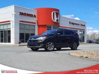 Awards:* ALG Canada Residual Value Awards New Price! Recent Arrival! Odometer is 5902 kilometers below market average! Nh731px 2019 Honda CR-V EX AWD CVT 1.5L I4 Turbocharged DOHC 16V LEV3-ULEV70 190hp Bridgewater Honda, Located in Bridgewater Nova Scotia.CR-V EX, AWD, 18 Aluminum Alloy Wheels, 4-Wheel Disc Brakes, ABS brakes, Air Conditioning, Apple CarPlay/Android Auto, Auto High-beam Headlights, Automatic temperature control, Backup Camera, Brake assist, Bumpers: body-colour, Cruise Control, Delay-off headlights, Driver door bin, Driver vanity mirror, Dual front impact airbags, Dual front side impact airbags, Electronic Stability Control, Fabric Seating Surfaces, Forward collision: Collision Mitigation Braking System (CMBS) + FCW mitigation, Four wheel independent suspension, Front anti-roll bar, Front Bucket Seats, Front dual zone A/C, Front fog lights, Front reading lights, Fully automatic headlights, Garage door transmitter: HomeLink, Heated door mirrors, Heated Front Bucket Seats, Heated front seats, Illuminated entry, Lane departure: Lane Keeping Assist System (LKAS) active, Low tire pressure warning, Occupant sensing airbag, Outside temperature display, Overhead airbag, Overhead console, Panic alarm, Passenger door bin, Passenger vanity mirror, Power door mirrors, Power driver seat, Power moonroof, Power steering, Power windows, Radio: 180-Watt AM/FM Audio System, Rear anti-roll bar, Rear window defroster, Rear window wiper, Remote keyless entry, Security system, Speed-sensing steering, Speed-Sensitive Wipers, Split folding rear seat, Spoiler, Steering wheel mounted audio controls, Tachometer, Telescoping steering wheel, Tilt steering wheel, Traction control, Trip computer, Turn signal indicator mirrors, Variably intermittent wipers.