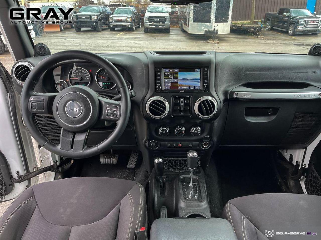 2014 Jeep Wrangler Unlimited Sahara - Photo #16