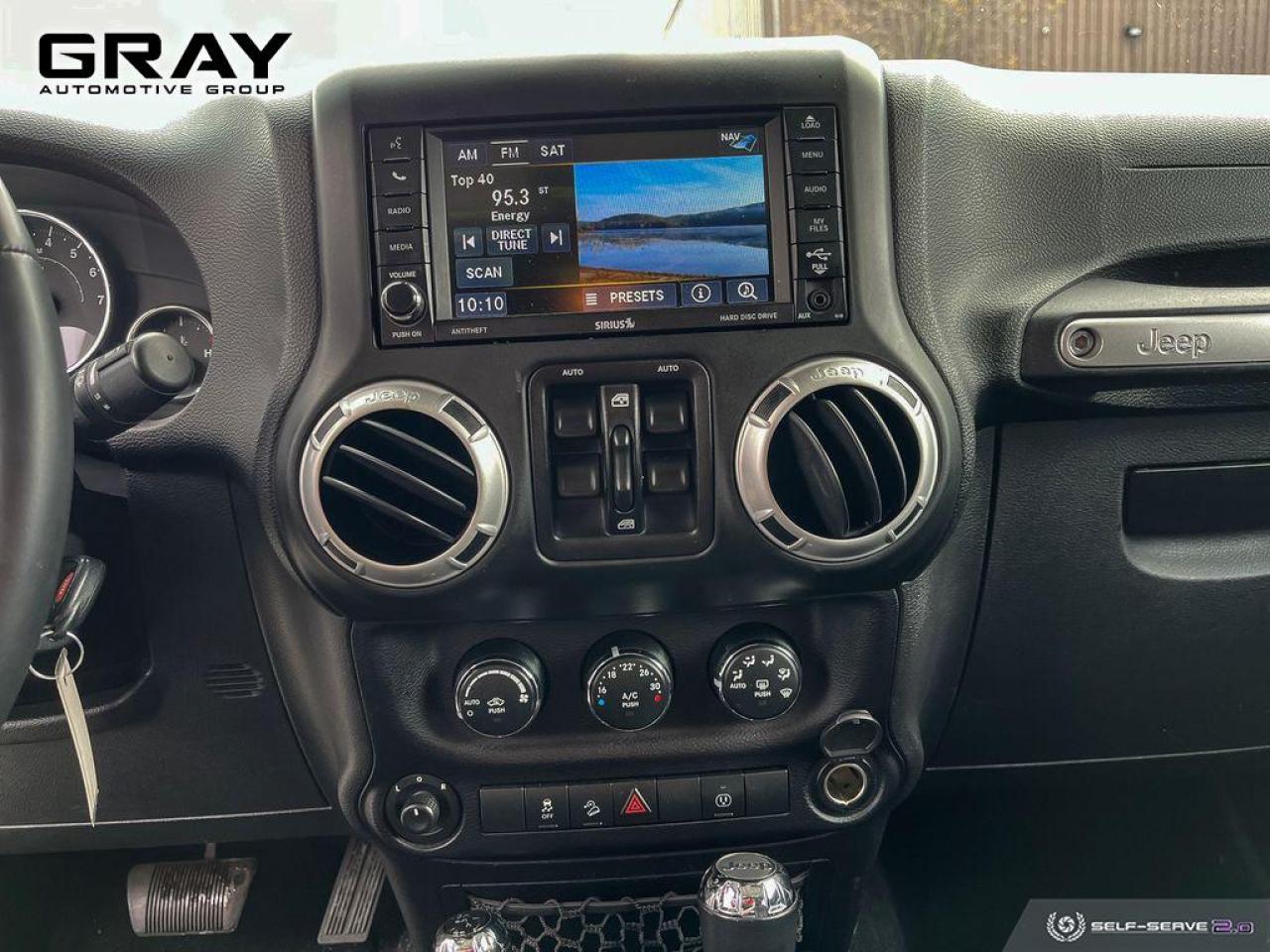 2014 Jeep Wrangler Unlimited Sahara - Photo #12