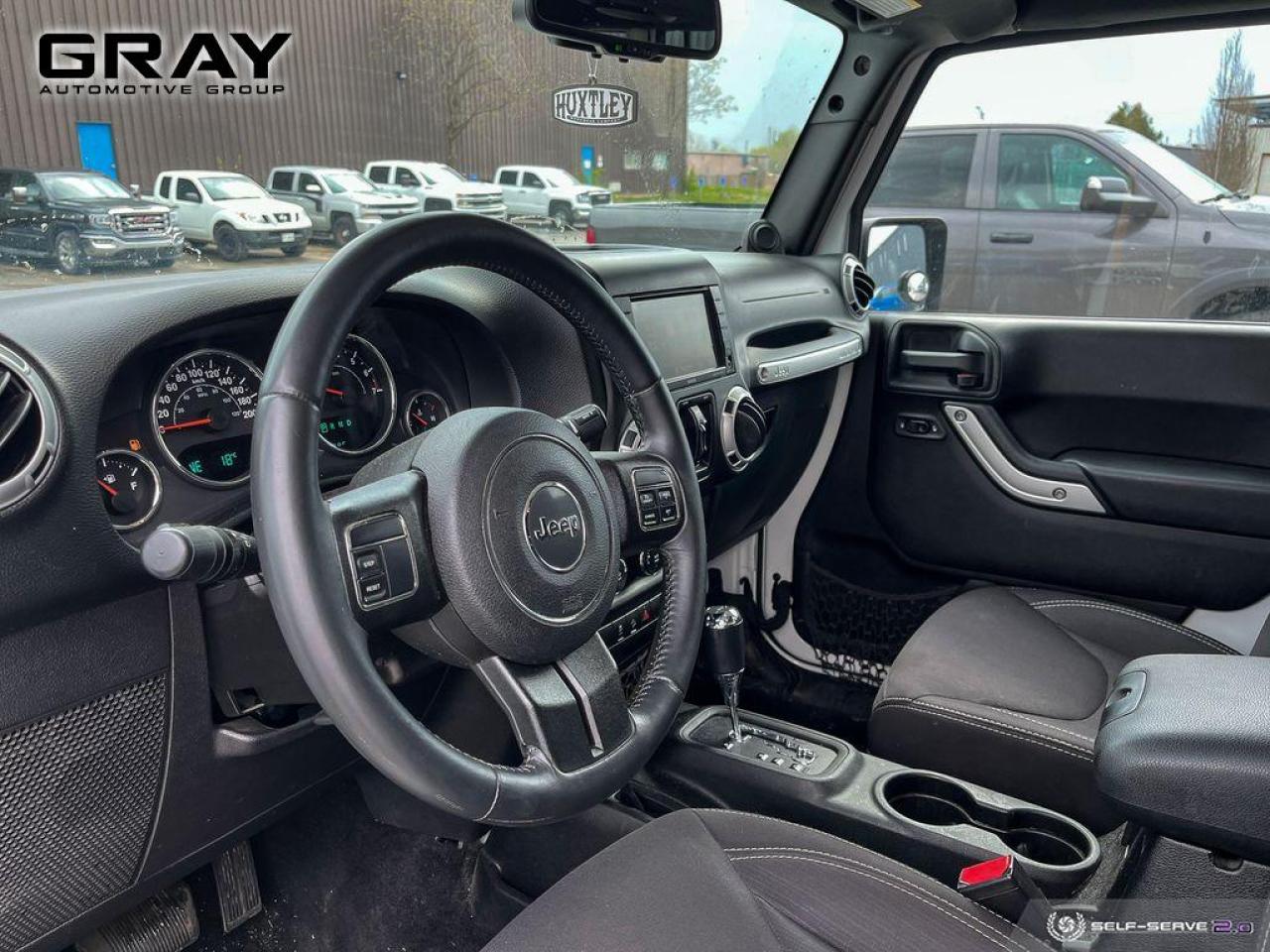 2014 Jeep Wrangler Unlimited Sahara - Photo #9