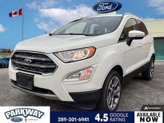 Diamond White 2020 Ford EcoSport Titanium 400A 400A 4D Sport Utility 2.0L I4 Ti-VCT GDI 6-Speed Automatic 4WD 3.51 Axle Ratio, Air Conditioning, Alloy wheels, AM/FM radio: SiriusXM, Block heater, Delay-off headlights, Equipment Group 400A, Front fog lights, Fully automatic headlights, Passenger door bin, Power driver seat, Power moonroof, Power steering, Power windows, Rear window defroster, Rear window wiper, Remote keyless entry, Remote Start System, Roof rack: rails only, Steering wheel mounted audio controls, Variably intermittent wipers.