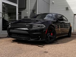 2018 Dodge Charger SRT 392 shown off in Black! It has black leather trimmed suede seating, heated/vented front seats, a leather-wrapped flat-bottom steering wheel with mounted audio/cruise controls (adaptive), a power sunroof, navigation, a backup camera, blind-spot monitoring, forward collision warning, and so much more. Full photos and description coming soon!Please note: this vehicle is showing a CarFax incident in the amount of $4,478.00