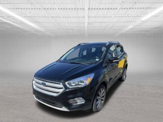 The 2018 Ford Escape Titanium is a well-equipped compact SUV known for its blend of comfort, technology, and versatility. Here are some key features you can expect from this model:Engine Options: The Escape Titanium typically offers a choice of engines. The standard engine is a 2.0-liter turbocharged EcoBoost four-cylinder, which delivers strong performance and good fuel efficiency. There may also be a smaller, more fuel-efficient engine option available, such as a 1.5-liter EcoBoost four-cylinder.Luxurious Interior: Inside the Escape Titanium, youll find a well-appointed cabin with upscale materials and plenty of amenities. Features often include leather upholstery, heated front seats, a power-adjustable drivers seat with memory settings, and a leather-wrapped steering wheel.Infotainment and Connectivity: Ford equips the Escape Titanium with the SYNC 3 infotainment system, which includes an intuitive touchscreen interface, smartphone integration via Apple CarPlay and Android Auto, Bluetooth connectivity, and available navigation. The system is user-friendly and responsive, enhancing the driving experience.Advanced Safety Features: Safety is a priority in the Escape Titanium, with a range of advanced driver assistance technologies available. These may include adaptive cruise control, blind-spot monitoring, rear cross-traffic alert, lane departure warning, and automatic emergency braking.Cargo Space and Versatility: Despite its compact size, the Escape offers impressive cargo space, with a rear seat that folds flat to accommodate larger items. The hands-free power liftgate is a convenient feature for loading and unloading cargo, especially when your hands are full.Driving Dynamics: The Escape Titanium provides a comfortable and composed ride, with responsive steering and agile handling that make it enjoyable to drive on both city streets and highways. The available all-wheel drive system enhances traction and stability, especially in inclement weather conditions.Overall, the 2018 Ford Escape Titanium is a compelling choice for buyers seeking a compact SUV with a luxurious interior, advanced technology features, and strong performance capabilities.