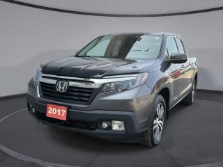 <b>Sunroof,  Leather Seats,  Bluetooth,  Adaptive Cruise Control,  Rear View Camera!</b><br> <br>    The Honda Ridgelines roomy cabin, ample storage, smooth ride, and innovative touches make its rivals seem outdated, says Car and Driver. This  2017 Honda Ridgeline is fresh on our lot in Sudbury. <br> <br>Honda threw out the rulebook with the Ridgeline and made a totally unconventional pickup truck. It has all the utility of a pickup combined with car-like ride quality. Its unique unibody design gives it excellent road manners and a smooth ride while maintaining the hard-working functionality of a truck. Theres never been a pickup thats easier to drive. Packed with quirks, versatility, and character the Honda Ridgeline is one of a kind. This  Crew Cab 4X4 pickup  has 82,782 kms. Its  gray in colour  . It has an automatic transmission and is powered by a  3.5L V6 24V GDI SOHC engine.  It may have some remaining factory warranty, please check with dealer for details. <br> <br> Our Ridgelines trim level is EX-L. The luxurious Ridgeline EX-L treats you to a generous host of features. It comes with a display audio system with Bluetooth, SiriusXM, and 7 speaker audio, heated leather seats, a heated steering wheel, front and rear parking sensors, remote start, a rear view camera, a power moonroof, LaneWatch blind spot detection, forward collision warning, adaptive cruise control, and much more. This vehicle has been upgraded with the following features: Sunroof,  Leather Seats,  Bluetooth,  Adaptive Cruise Control,  Rear View Camera,  Heated Steering Wheel,  Blind Spot Detection. <br> <br>To apply right now for financing use this link : <a href=https://www.palladinohonda.com/finance/finance-application target=_blank>https://www.palladinohonda.com/finance/finance-application</a><br><br> <br/><br>Palladino Honda is your ultimate resource for all things Honda, especially for drivers in and around Sturgeon Falls, Elliot Lake, Espanola, Alban, and Little Current. Our dealership boasts a vast selection of high-class, top-quality Honda models, as well as expert financing advice and impeccable automotive service. These factors arent what set us apart from other dealerships, though. Rather, our uncompromising customer service and professionalism make every experience unforgettable, and keeps drivers coming back. The advertised price is for financing purchases only. All cash purchases will be subject to an additional surcharge of $2,501.00. This advertised price also does not include taxes and licensing fees.<br> Come by and check out our fleet of 100+ used cars and trucks and 50+ new cars and trucks for sale in Sudbury.  o~o