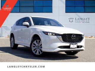 <p><strong><span style=font-family:Arial; font-size:18px;>Sunroof | Leather | Backup Cam - Redefine your road reality with the sheer power and unparalleled elegance of our newest automotive marvel..</span></strong></p> <p><span style=font-family:Arial; font-size:18px;>Introducing the 2023 Mazda CX-5 Signature SUV, a pre-owned gem with only 13,849 km on the odometer, now available at Langley Chrysler.. Dressed in a sophisticated White exterior and complemented by a luxurious Black leather interior, this vehicle is the epitome of style and performance.. Step inside and let the power moonroof flood the cabin with natural light, while you sink into the plush leather seats..</span></p> <p><span style=font-family:Arial; font-size:18px;>Enjoy the convenience of the backup camera, making parking a breeze, and experience the joy of driving with a 2.5L 4-cylinder engine paired with a 6-speed automatic transmission that promises a smooth and responsive ride.. This SUV isnt just about looks and performance; its packed with features to make every drive comfortable and safe.. With options like traction control, ABS brakes, and electronic stability control, you can drive with confidence..</span></p> <p><span style=font-family:Arial; font-size:18px;>The dual-zone automatic temperature control ensures everyone stays comfortable, while the heated door mirrors and rain-sensing wipers keep your view clear, no matter the weather.. Ever thought of a car as your personal assistant? This CX-5 comes close! With traffic sign information, an emergency communication system, and an outside temperature display, it keeps you informed and prepared.. Plus, the genuine wood dashboard and door panel inserts add a touch of elegance to your driving experience..</span></p> <p><span style=font-family:Arial; font-size:18px;>And heres a funny fact to brighten your day: Did you know the average car has around 30,000 parts? Thankfully, you only need to enjoy the ones that matter in this Mazda CX-5!

Dont just love your car, love buying it! Visit Langley Chrysler today to experience this 2023 Mazda CX-5 Signature in person.. With features like a memory seat, auto-dimming rearview mirror, and ventilated front seats, this SUV is ready to redefine your driving experience.. Act fast, because a vehicle this exceptional wont be on the lot for long!.</span></p>Documentation Fee $968, Finance Placement $628, Safety & Convenience Warranty $699

<p>*All prices plus applicable taxes, applicable environmental recovery charges, documentation of $599 and full tank of fuel surcharge of $76 if a full tank is chosen. <br />Other protection items available that are not included in the above price:<br />Tire & Rim Protection and Key fob insurance starting from $599<br />Service contracts (extended warranties) for coverage up to 7 years and 200,000 kms starting from $599<br />Custom vehicle accessory packages, mudflaps and deflectors, tire and rim packages, lift kits, exhaust kits and tonneau covers, canopies and much more that can be added to your payment at time of purchase<br />Undercoating, rust modules, and full protection packages starting from $199<br />Financing Fee of $500 when applicable<br />Flexible life, disability and critical illness insurances to protect portions of or the entire length of vehicle loan</p>