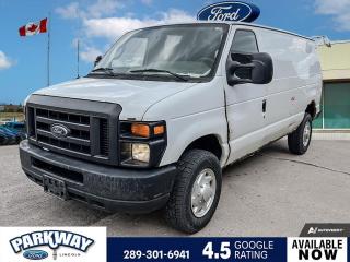 White 2009 Ford E-350SD Commercial 3D Cargo Van 5.4L V8 Flex Fuel 4-Speed Automatic with Overdrive RWD Air Conditioning, AM/FM radio, Block heater, Driver door bin, Passenger door bin, Power steering, Tilt steering wheel, Variably intermittent wipers.