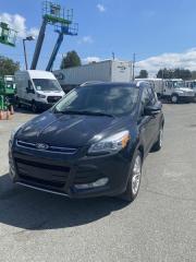 2014 Ford Escape Titanium 4WD, 2.0L, 4 cylinder, 4 door, automatic, 4WD, 4-Wheel ABS, cruise control, backup camera, bluetooth,  air conditioning, AM/FM radio, power door locks, power windows, power mirrors, black exterior, tan interior, leather. $8,720.00 plus $375 processing fee, $9,095.00 total payment obligation before taxes.  Listing report, warranty, contract commitment cancellation fee, financing available on approved credit (some limitations and exceptions may apply). All above specifications and information is considered to be accurate but is not guaranteed and no opinion or advice is given as to whether this item should be purchased. We do not allow test drives due to theft, fraud and acts of vandalism. Instead we provide the following benefits: Complimentary Warranty (with options to extend), Limited Money Back Satisfaction Guarantee on Fully Completed Contracts, Contract Commitment Cancellation, and an Open-Ended Sell-Back Option. Ask seller for details or call 604-522-REPO(7376) to confirm listing availability.