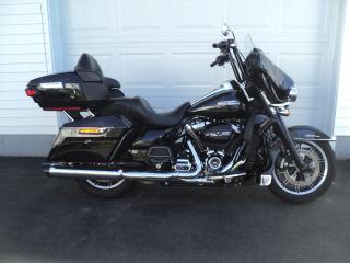 <p>Excellent condition! Financing available! 107 Milwaukee engine. Cruise control, blacked out front end, black 16  apes, blacked out crash bars, big screen stereo with navigation, black tipped after market pipes, blacked out breather kit, 4 speaker stereo system, lowers, driving lights. Real nice Harley! Contact Mike at (902) 899-2384 for information.</p>
