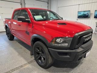 <div>The 2022 Ram 1500 Classic Tradesman Crew Cab SWB 4WD is the epitome of rugged elegance and robust functionality. This used truck stands out with its vibrant red exterior, making a bold statement on and off the road. Under the hood lies a powerful 3.6L Pentastar V6 engine paired with an 8-speed automatic transmission, ensuring a smooth yet commanding drive. The 4WD drivetrain ensures this truck is ready for any terrain, offering both versatility and reliability.</div><br /><div><br></div><br /><div>Step inside, and youll be greeted by a spacious and sleek cabin adorned in black. The interior is both comfortable and practical, designed to cater to both everyday needs and adventurous excursions. </div><br /><div><br></div><br /><div>Key Features:</div><br /><div>- 3.6L Naturally Aspirated V6 engine</div><br /><div>- 8-speed automatic transmission</div><br /><div>- Four-wheel drive (4X4)</div><br /><div>- 20-inch black aluminum wheels </div><br /><div>- 4,350 lb max towing capacity</div><br /><div>- ParkView backup camera for easy parking and reversing</div><br /><div>- Keyless entry and start for convenience</div><br /><div>- Apple CarPlay and Android Auto compatibility for seamless smartphone integration</div><br /><div>- 8.4-inch touchscreen display for an intuitive user experience</div><br /><div>- Remote start system for those chilly mornings</div><br /><div>- Tonneau cover to protect your cargo</div><br /><div><br></div><br /><div>Safety and convenience are paramount in this vehicle. The ParkView backup camera ensures you can maneuver with confidence, while the keyless entry and start system adds a layer of convenience to your daily routine. The remote start system is a fantastic feature for those colder days, allowing you to warm up the vehicle before you even step outside.</div><br /><div><br></div><br /><div>Entertainment and connectivity are well-covered with Apple CarPlay and Android Auto compatibility, accessible through the large 8.4-inch touchscreen display. Whether its navigation, music, or hands-free calls, your digital life integrates seamlessly into your drive.</div><br /><div><br></div><br /><div>The exterior of the truck is complemented by the 20-inch black aluminum wheels, adding a touch of sophistication to its rugged profile. The tonneau cover is a practical addition, keeping your cargo safe and secure from the elements.</div><br /><div><br></div><br /><div>This 2022 Ram 1500 Classic Tradesman Crew Cab SWB 4WD is the perfect blend of power, comfort, and modern technology, ready to tackle any challenge you throw its way. <br></div><br /><div><br></div><br /><div>At Sisson Auto, we strive to make your vehicle purchase as seamless and stress-free as possible. Our transparent pricing means no haggling, and there are no hidden fees. For your peace of mind, we offer a 3-day/600 km No-Hassle Return Policy, a 30-day exchange privilege, and minimum warranties with 24-hour roadside assistance. Every vehicle undergoes a safety recall check and comes with a complimentary CarFax history report. Plus, we offer free home delivery within 200 km. Dealer permit #5471.</div><br /><div><br></div><br /><div>** This description was written by AI based on information provided about the vehicle. AI can sometimes produce incorrect information. Please confirm all details with the dealership. </div>