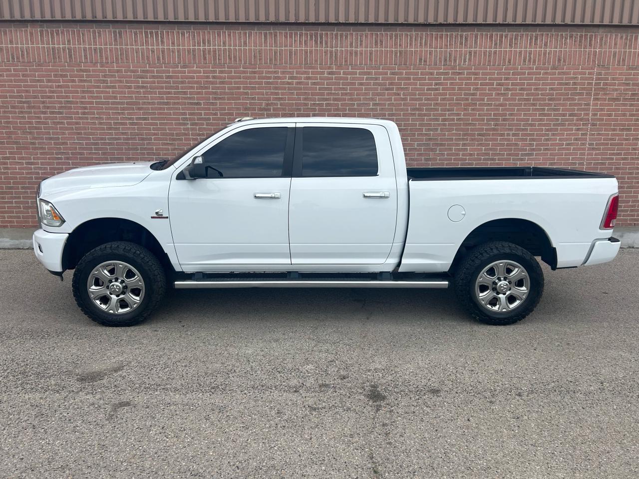 2015 RAM 2500 4WD Crew Cab 149" Longhorn Limited Photo3