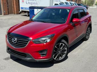 2016 Mazda CX-5 GT Fully Loaded<br><div>
Safety Certified included in Price | **6 Month Warranty included in Price | Navigation | Backup Camera | Backup Sensor | Bluetooth | Heated Seats | Climate control | Sunroof | Blind Spot Sensors | Financing Available | By Appointment Only: 905-531-5370 

DON’T MISS OUT ON THIS BEAUTIFUL 2016 Mazda CX-5 GT for only $15495 Plus HST and Licensing. This beautiful SUV boasts a 2.5L engine powering this Automatic transmission. Sunroof, Reverse Camera, Air Conditioning, 5 Passenger, Alloy Wheels, Bluetooth, Heated Seats, Tilt Steering Wheel, Steering Radio Controls, Power Windows, Navigation, Cruise Control and Much More! 

Recent Maintenance: ALL FOUR BRAKE PADS AND ROTORS CHANGED | OIL CHANGE | PROFESSIONALLY DETAILED 

Buy with trust and confidence from an Ontario registered dealer. Call today at 905-531-5370 to book an appointment.</div>