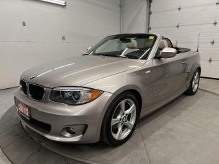 ONLY 85,400 KMS AND CERTIFIED!! Stunning automatic 128i Cabriolet w/ 230HP I-6 and Executive Package incl. power-retracting convertible soft top, heated leather seats, rear park sensors, 17-inch alloys, power seats w/ driver memory, Bluetooth, rain-sensing wipers, automatic headlights, auto-dimming rearview mirror, garage door opener, cruise control, leather-wrapped steering wheel and cruise control!