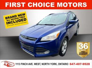 Welcome to First Choice Motors, the largest car dealership in Toronto of pre-owned cars, SUVs, and vans priced between $5000-$15,000. With an impressive inventory of over 300 vehicles in stock, we are dedicated to providing our customers with a vast selection of affordable and reliable options. <br><br>Were thrilled to offer a used 2014 Ford Escape SE, blue color with 250,000km (STK#7358) This vehicle was $7990 NOW ON SALE FOR $6990. It is equipped with the following features:<br>- Automatic Transmission<br>- Heated seats<br>- Bluetooth<br>- Reverse camera<br>- Alloy wheels<br>- Power windows<br>- Power locks<br>- Power mirrors<br>- Air Conditioning<br><br>At First Choice Motors, we believe in providing quality vehicles that our customers can depend on. All our vehicles come with a 36-day FULL COVERAGE warranty. We also offer additional warranty options up to 5 years for our customers who want extra peace of mind.<br><br>Furthermore, all our vehicles are sold fully certified with brand new brakes rotors and pads, a fresh oil change, and brand new set of all-season tires installed & balanced. You can be confident that this car is in excellent condition and ready to hit the road.<br><br>At First Choice Motors, we believe that everyone deserves a chance to own a reliable and affordable vehicle. Thats why we offer financing options with low interest rates starting at 7.9% O.A.C. Were proud to approve all customers, including those with bad credit, no credit, students, and even 9 socials. Our finance team is dedicated to finding the best financing option for you and making the car buying process as smooth and stress-free as possible.<br><br>Our dealership is open 7 days a week to provide you with the best customer service possible. We carry the largest selection of used vehicles for sale under $9990 in all of Ontario. We stock over 300 cars, mostly Hyundai, Chevrolet, Mazda, Honda, Volkswagen, Toyota, Ford, Dodge, Kia, Mitsubishi, Acura, Lexus, and more. With our ongoing sale, you can find your dream car at a price you can afford. Come visit us today and experience why we are the best choice for your next used car purchase!<br><br>All prices exclude a $10 OMVIC fee, license plates & registration  and ONTARIO HST (13%)