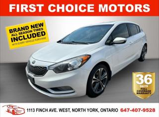 Welcome to First Choice Motors, the largest car dealership in Toronto of pre-owned cars, SUVs, and vans priced between $5000-$15,000. With an impressive inventory of over 300 vehicles in stock, we are dedicated to providing our customers with a vast selection of affordable and reliable options. <br><br>Were thrilled to offer a used 2014 Kia Forte5 EX, white color with 183,000km (STK#7372) This vehicle was $10990 NOW ON SALE FOR $9990. It is equipped with the following features:<br>- Automatic Transmission<br>- Sunroof<br>- Heated seats<br>- Bluetooth<br>- Reverse camera<br>- Alloy wheels<br>- Power windows<br>- Power locks<br>- Power mirrors<br>- Air Conditioning<br><br>At First Choice Motors, we believe in providing quality vehicles that our customers can depend on. All our vehicles come with a 36-day FULL COVERAGE warranty. We also offer additional warranty options up to 5 years for our customers who want extra peace of mind.<br><br>Furthermore, all our vehicles are sold fully certified with brand new brakes rotors and pads, a fresh oil change, and brand new set of all-season tires installed & balanced. You can be confident that this car is in excellent condition and ready to hit the road.<br><br>At First Choice Motors, we believe that everyone deserves a chance to own a reliable and affordable vehicle. Thats why we offer financing options with low interest rates starting at 7.9% O.A.C. Were proud to approve all customers, including those with bad credit, no credit, students, and even 9 socials. Our finance team is dedicated to finding the best financing option for you and making the car buying process as smooth and stress-free as possible.<br><br>Our dealership is open 7 days a week to provide you with the best customer service possible. We carry the largest selection of used vehicles for sale under $9990 in all of Ontario. We stock over 300 cars, mostly Hyundai, Chevrolet, Mazda, Honda, Volkswagen, Toyota, Ford, Dodge, Kia, Mitsubishi, Acura, Lexus, and more. With our ongoing sale, you can find your dream car at a price you can afford. Come visit us today and experience why we are the best choice for your next used car purchase!<br><br>All prices exclude a $10 OMVIC fee, license plates & registration  and ONTARIO HST (13%)