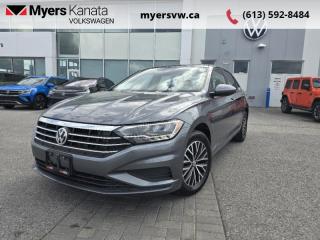 <b>Navigation,  Sunroof,  Blind Spot Detection,  Heated Seats,  Heated Steering Wheel!</b><br> <br>  Compare at $25512 - Our Price is just $25499! <br> <br>   With a very well utilized interior and excellent fit and finish, this 2021 Jetta is simply a pleasure to ride in. This  2021 Volkswagen Jetta is fresh on our lot in Kanata. <br> <br>Redesigned. Not over designed. Rather than adding needless flash, the Jetta has been redesigned for a tasteful, more premium look and feel. One quick glance is all it takes to appreciate the result. Its sporty. Its sleek. It makes a statement without screaming. The overall effect stands out anywhere. Its roomy and well finished interior provides the best of comforts and will help keep this elegant sedan ageless and beautiful for many years to come.This  sedan has 76,935 kms. Its  platinum gray metallic in colour  . It has an automatic transmission and is powered by a  1.4L I4 16V GDI DOHC Turbo engine.  This unit has some remaining factory warranty for added peace of mind. <br> <br> Our Jettas trim level is Highline. Upgrade to this Jetta Highline and youll get features like these aluminum wheels, a large Rail2Rail power sunroof, leatherette heated seats and a heated-leather wrapped steering wheel, fully automatic LED headlamps, a larger 8 inch touchscreen infotainment system with  satellite navigation, Android Auto and Apple CarPlay, blind spot monitor with rear traffic alert, cruise control, a proximity key with remote keyless entry, a rear view camera and much more. This vehicle has been upgraded with the following features: Navigation,  Sunroof,  Blind Spot Detection,  Heated Seats,  Heated Steering Wheel,  Led Headlights,  Android Auto. <br> <br>To apply right now for financing use this link : <a href=https://www.myersvw.ca/en/form/new/financing-request-step-1/44 target=_blank>https://www.myersvw.ca/en/form/new/financing-request-step-1/44</a><br><br> <br/><br>Backed by Myers Exclusive NO Charge Engine/Transmission for life program lends itself for your peace of mind and you can buy with confidence. Call one of our experienced Sales Representatives today and book your very own test drive! Why buy from us? Move with the Myers Automotive Group since 1942! We take all trade-ins - Appraisers on site - Full safety inspection including e-testing and professional detailing prior delivery! Every vehicle comes with a free Car Proof History report.<br><br>*LIFETIME ENGINE TRANSMISSION WARRANTY NOT AVAILABLE ON VEHICLES MARKED AS-IS, VEHICLES WITH KMS EXCEEDING 140,000KM, VEHICLES 8 YEARS & OLDER, OR HIGHLINE BRAND VEHICLES (eg.BMW, INFINITI, CADILLAC, LEXUS...). FINANCING OPTIONS NOT AVAILABLE ON VEHICLES MARKED AS-IS OR AS-TRADED.<br> Come by and check out our fleet of 40+ used cars and trucks and 120+ new cars and trucks for sale in Kanata.  o~o