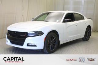 This White Knuckle AWD 2014 Dodge Charger is powered by a Regular Unleaded V-6 3.6 L engine. It has an attractively styled cabin thats built with quality materials. The seats are roomy, comfortable and seat five. It comes equipped with a six-way power-adjustable drivers seat, a six-speaker stereo, an auxiliary jack, a USB port and a Uconnect infotainment system with a 4.3-inch touch-screen display. The Dodge Charger is an American muscle car, pumped, powerful, and full of swagger that takes you straight back to the wildly optimistic American sedans of the 60s. At the same time, its handsomely designed and has world-class fit and finish. From crankshaft to door handles, everything operates with fine precision and the promise of long-lasting service. Ride quality is very good, and the solid structure soaks up road surface irregularities. Yet the steering is lively and communicative, keeping you in direct touch with the road, and braking performance is exemplary. A full-size, four-door sedan, Charger is a roomy five-seat hauler. Come down to Capital today for a test drive! Check out this vehicles pictures, features, options and specs, and let us know if you have any questions. Helping find the perfect vehicle FOR YOU is our only priority.P.S...Sometimes texting is easier. Text (or call) 306-988-7738 for fast answers at your fingertips!Dealer License #914248Disclaimer: All prices are plus taxes & include all cash credits & loyalties. See dealer for Details. Dealer Permit # 914248