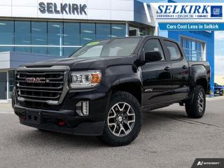 <b>Leather Seats,  Remote Start,  Off-Road Suspension,  Aluminum Wheels,  Apple CarPlay!</b><br> <br>  On Sale! Save $1497 on this one, weve marked it down from $44490.   Exceptionally stable and very capable of hauling the trickiest of loads, this GMC Canyon is the perfect multi-purpose everyday truck. This  2022 GMC Canyon is for sale today in Selkirk. <br> <br>This GMC Canyon is built around the idea of a all-in-one work truck, providing the durability and premium detail you expect from a Professional Grade GMC pickup. Capable, versatile and entirely refined, this mid-size Canyon balances power and technology in a package that is spacious and efficient. Whether you need a pickup truck for some occasional hauling, off-road fun, or you just want to have a pickup truck, this premium GMC Canyon fits the bill. It has almost as much capability as its bigger counterparts, but its easier to maneuver, easier to park, and will provide you with better fuel economy. Where ever you and your family go, go confidently in this GMC Canyon that personifies GMCs attitude and dedication to precision.This  Crew Cab 4X4 pickup  has 58,059 kms. Its  onyx black in colour  . It has an automatic transmission and is powered by a  308HP 3.6L V6 Cylinder Engine. <br> <br> Our Canyons trim level is AT4 w/Leather. Upgrading to this 2021 Canyon AT4 is a great choice as it comes loaded with more features like an off-road suspension, leather front seats and an automatic locking rear differential with an advanced hill descent control, automatic climate control, a remote vehicle starter system and unique exterior and interior features such as red recovery hooks. This Canyon also includes an EZ lift and lower tailgate, front fog lamps, 4G WiFi, GMC Connected Access, a leather-wrapped steering wheel with audio controls, rear park assist and remote keyless entry. It even includes unique aluminum wheels, signature LED lamps, a large 8 inch touchscreen display paired with Apple CarPlay and Android Auto, StabiliTrak with trailer sway control, unique CornerStep rear bumper, traction control, a 6-way power driver seat and 4 way power passenger seat plus much more. This vehicle has been upgraded with the following features: Leather Seats,  Remote Start,  Off-road Suspension,  Aluminum Wheels,  Apple Carplay,  Android Auto,  Ez Lift Tailgate. <br> <br>To apply right now for financing use this link : <a href=https://www.selkirkchevrolet.com/pre-qualify-for-financing/ target=_blank>https://www.selkirkchevrolet.com/pre-qualify-for-financing/</a><br><br> <br/><br>Selkirk Chevrolet Buick GMC Ltd carries an impressive selection of new and pre-owned cars, crossovers and SUVs. No matter what vehicle you might have in mind, weve got the perfect fit for you. If youre looking to lease your next vehicle or finance it, we have competitive specials for you. We also have an extensive collection of quality pre-owned and certified vehicles at affordable prices. Winnipeg GMC, Chevrolet and Buick shoppers can visit us in Selkirk for all their automotive needs today! We are located at 1010 MANITOBA AVE SELKIRK, MB R1A 3T7 or via phone at 204-482-1010.<br> Come by and check out our fleet of 60+ used cars and trucks and 200+ new cars and trucks for sale in Selkirk.  o~o