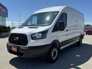 <p style=text-align: center;><span style=font-size: 18pt;><strong>2019 FORD TRANSIT </strong></span><span style=font-size: 24px;><strong>T-250 148 MED RF 9000 GVWR SLIDING RH DR</strong></span></p><p style=text-align: center;><span style=font-size: 18pt;><strong>3.7L TI-VCT V6 ENGINE</strong></span></p><p style=text-align: center;><span style=font-size: 14pt;>275 HORSEPOWER | 260 LB-FT OF TORQUE</span></p><p style=text-align: center;><span style=font-size: 14pt;>13L/100KM HIGHWAY | 16.8L/100KM CITY | 15.6L/100KM COMBINED</span></p><p style=text-align: center;><span style=font-size: 18pt;><strong>6-SPEED SELECTSHIFT AUTOMATIC TRANSMISSION</strong></span></p><p style=text-align: center;><span style=font-size: 18pt;><strong>16 SILVER STEEL  WITH BLACK HUBCAP</strong></span></p><p style=text-align: center;> </p><p style=text-align: center;> </p><p style=text-align: center;><span style=text-decoration: underline;><span style=font-size: 18pt;>INCLUDES TOMMY GATE LIFT</span></span></p><p style=text-align: center;><span style=text-decoration: underline;><span style=font-size: 18pt;>RATED AT 1,300 LBS CAPACITY</span></span></p><p style=text-align: center;> </p><p style=text-align: center;> </p><p style=text-align: center;><strong><span style=font-size: 14pt;>MECHANICAL</span></strong></p><p style=text-align: center;><span style=font-size: 14pt;>Full-size spare wheel and tire, 4-ton jack and tool kit, Side-wind stabilization</span></p><p style=text-align: center;><strong><span style=font-size: 14pt;>INTERIOR</span></strong></p><p style=text-align: center;><span style=font-size: 14pt;>2-passenger vinyl seating, 4-way manual driver and front-passenger seats with driver’s inboard armrest, AM/FM stereo with audio input jack and digital clock, Black plastic stepwell pads, Cargo area, LED load compartment lighting  with rear switch, Cargo area tie-down hooks, D-pillar weld nuts, Flooring – Vinyl front, Front air conditioning, Front cloth headliner, Rear cargo door pull-and-release exit handle, Windows – Power front </span></p><p style=text-align: center;><strong><span style=font-size: 14pt;>EXTERIOR</span></strong></p><p style=text-align: center;><span style=font-size: 14pt;>Carbon Black grille with Carbon Black surround, Center high-mounted stop lamp (SRW), Doors – 180° rear cargo with key-lock cylinder, Doors – 253° rear cargo with key-lock cylinder, Doors – Sliding passenger-side, Headlamps – Halogen with Black trim Mirrors – Short-arm, power sideview Rear bumper, Rear bumper – Carbon Black, molded-in-color  with bumper step</span></p><p style=text-align: center;><strong><span style=font-size: 14pt;>SAFETY & SECURITY</span></strong></p><p style=text-align: center;><span style=font-size: 14pt;>Passenger-side front airbag deactivation switch, Rear view camera – High-mount</span></p><p style=text-align: center;> </p><p style=text-align: center;> </p><p style=box-sizing: border-box; margin-bottom: 1rem; margin-top: 0px; color: #212529; font-family: -apple-system, BlinkMacSystemFont, Segoe UI, Roboto, Helvetica Neue, Arial, Noto Sans, Liberation Sans, sans-serif, Apple Color Emoji, Segoe UI Emoji, Segoe UI Symbol, Noto Color Emoji; font-size: 16px; background-color: #ffffff; text-align: center; line-height: 1;><span style=box-sizing: border-box; font-family: arial, helvetica, sans-serif;><span style=box-sizing: border-box; font-weight: bolder;><span style=box-sizing: border-box; font-size: 14pt;>Here at Lanoue/Amfar Sales, Service & Leasing in Tilbury, we take pride in providing the public with a wide variety of High-Quality Pre-owned Vehicles. We recondition and certify our vehicles to a level of excellence that exceeds the Status Quo. We treat our Customers like family and provide the highest level of service from Start to Finish. If you’d like a smooth & stress-free car shopping experience, give one of our Sales Associates a call at 1-844-682-3325 to help you find your next NEW-TO-YOU vehicle!</span></span></span></p><p style=box-sizing: border-box; margin-bottom: 1rem; margin-top: 0px; color: #212529; font-family: -apple-system, BlinkMacSystemFont, Segoe UI, Roboto, Helvetica Neue, Arial, Noto Sans, Liberation Sans, sans-serif, Apple Color Emoji, Segoe UI Emoji, Segoe UI Symbol, Noto Color Emoji; font-size: 16px; background-color: #ffffff; text-align: center; line-height: 1;><span style=box-sizing: border-box; font-family: arial, helvetica, sans-serif;><span style=box-sizing: border-box; font-weight: bolder;><span style=box-sizing: border-box; font-size: 14pt;>Although we try to take great care in being accurate with the information in this listing, from time to time, errors occur. The vehicle is priced as it is physically equipped. Minor variances will not effect pricing. Please verify the vehicle is As Expected when you visit. Thank You!</span></span></span></p>