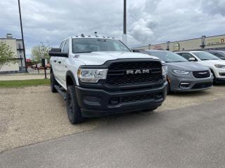 <p>Fully Inspected, ALL Work Complete and Included in Price! Call Us For More Info at 587-409-5859</p>  <p>Introducing the 2022 Ram 2500 Tradesman 4x4, a powerhouse of performance and reliability designed to tackle any task with ease. This rugged beast combines brawn with brains, offering unmatched capability and innovation for both work and play.</p>  <p>Under the hood, the Ram 2500 Tradesman roars to life with its formidable engine options, delivering uncompromising power and efficiency to conquer even the toughest terrain. Whether hauling heavy loads or navigating off-road trails, this truck effortlessly rises to the occasion.</p>  <p>Inside, the Tradesman welcomes you with a spacious and comfortable cabin, packed with modern amenities and advanced technology to enhance your driving experience. From its intuitive infotainment system to its array of safety features, every journey is a seamless blend of comfort and confidence.</p>  <p>But its on the job site where the Ram 2500 Tradesman truly shines, with its rugged exterior and durable construction ready to take on any challenge. With impressive towing and payload capacities, along with versatile cargo management solutions, this truck is the ultimate tool for getting the job done right, every time.</p>  <p>So whether youre hauling equipment to the job site or embarking on an off-road adventure, the 2022 Ram 2500 Tradesman 4x4 is your dependable partner in productivity and performance, setting the standard for excellence in the world of trucks.</p>  <p>Call 587-409-5859 for more info or to schedule an appointment! Listed Pricing is valid for 72 hours. Financing is available, please see dealer for term availability and interest rates. AMVIC Licensed Business.</p>