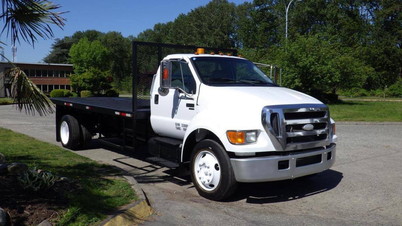 2006 Ford F-650 16 Foot Flat Deck 2WD Diesel, Hydraulic  Brakes, 7.2L L6 DIESEL engine, 6 cylinder, Air Emergency Brakes, 2 door, automatic, 4X2, cruise control, air conditioning, AM/FM radio, power door locks, power windows, white exterior, black interior. Width of the deck 8 foot 5 inches Certificate and Decal Valid to March 2025  $24,720.00 plus $375 processing fee, $25,095.00 total payment obligation before taxes.  Listing report, warranty, contract commitment cancellation fee, financing available on approved credit (some limitations and exceptions may apply). All above specifications and information is considered to be accurate but is not guaranteed and no opinion or advice is given as to whether this item should be purchased. We do not allow test drives due to theft, fraud, acts of vandalism and undetectable impaired driving. Instead we provide the following benefits: Complimentary Warranty (with options to extend), Limited Money Back Satisfaction Guarantee on Fully Completed Contracts, Contract Commitment Cancellation, and an Open-Ended Sell-Back Option. Ask seller for details or call 604-522-REPO(7376) to confirm listing availability.