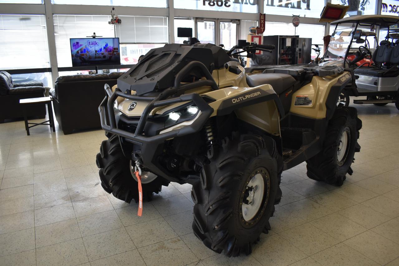 <p>2023 Can-Am Outlander X MR 1000R</p><p> </p><p><strong>LOW MILEAGE; <em><span style=text-decoration: underline;>ONLY 753 KMS </span></em></strong></p><p> </p><p>PACKAGE HIGHLIGHTS</p><p>• Rotax® snorkeled V-Twin engine with relocated CVT intake and outlet</p><p>• Relocated radiator • Continuously Variable Transmission (CVT) with extra low L-gear</p><p>• Tri-Mode Dynamic Power Steering (DPS™)</p><p>• Visco-4Lok† front differential</p><p>• Front and rear gas shocks</p><p>• 14 in. cast-aluminum wheels</p><p>• 30 in. ITP Cryptid† tires</p><p>• Heavy-duty front and rear bumpers</p><p>• 3,500-lb (1,588 kg) winch</p><p>• Mud-riding footrests</p><p>• 59 in. wheelbase</p><p>• X-package coloration, graphics and seat cover</p><p>and much more to offer!</p><p> </p><p>If you have any interest or questions, please feel free to reach out to us. We are looking forward to connecting with you.</p><p> </p>