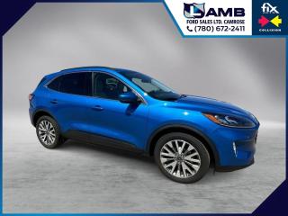 <p>THE PRICE YOU SEE, PLUS GST. GUARANTEED! PREVIOUS EXECUTIVE DRIVEN VEHICLE! APPLE CARPLAY/ANDROID AUTO.2.0 LITER ECOBOOST, 8 SPEED AUTO, HEATED STEERING WHEEL, ADAPTIVE CRUISE, SYNC 3, FORD PASS CONNECT, BLIS. The 2021 Ford Escape Titanium AWD with the 2.0L EcoBoost engine is a high-performance trim level that offers a great balance of power, capability, and luxury features. The 2.0L EcoBoost engine is a twin-scroll turbocharged engine that produces 250 horsepower and 280 lb.-ft. of torque.Its paired with an 8-speed automatic transmission, which helps to optimize power delivery and fuel efficiency. The AWD system in the Titanium trim is designed to provide improved traction and control on a variety of surfaces.The system uses sensors to monitor the vehicles speed, steering angle, and wheel slippage, and can adjust power distribution between the front and rear wheels as needed. The Titanium trim comes with premium leather-trimmed seats and features like a heated steering wheel and shift knob. Youll also get standard features like a dual-zone electronic automatic temperature control system, a premium audio system, and a navigation system. Do you want to know more about this vehicle, CALL, CLICK OR COME ON IN!*AMVIC Licensed Dealer; CarProof and Full Mechanical Inspection Included.</p>