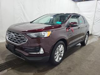 THE PRICE YOU SEE, PLUS GST. GUARANTEED!  PREVIOUS EXECUTIVE DRIVEN VEHICLE!  APPLE CARPLAY/ANDROID AUTO.   2.0 LITER ECOBOOST, 8 SPEED AUTO, ADAPTIVE CRUISE, HEATED STEERING WHEEL,  REMOTE START, FORD PASS CONNECT.         The Ford Edge Titanium with all-wheel drive (AWD) is a high-end trim level of the Ford Edge, a mid-size SUV. The Ford Edge Titanium features a sleek and modern design, with a distinctive grille, LED headlights, and a aggressive front bumper. The AWD system is equipped with an advanced terrain management system that allows you to adjust the system to suit different driving conditions, such as snow, sand, or mud.   The interior of the Ford Edge Titanium is luxurious and well-appointed, with premium leather-trimmed seats, heated and cooled front seats, and heated rear seats.  The Ford Edge Titanium comes with a range of convenience features, including, Power liftgate with hands-free operation, Power moonroof, Heated steering wheel and Dual-zone electronic automatic temperature control. Wireless charging now available in the center console for quick and convenient device charging.Do you want to know more about this vehicle, CALL, CLICK OR COME ON IN!*AMVIC Licensed Dealer; CarProof and Full Mechanical Inspection Included.